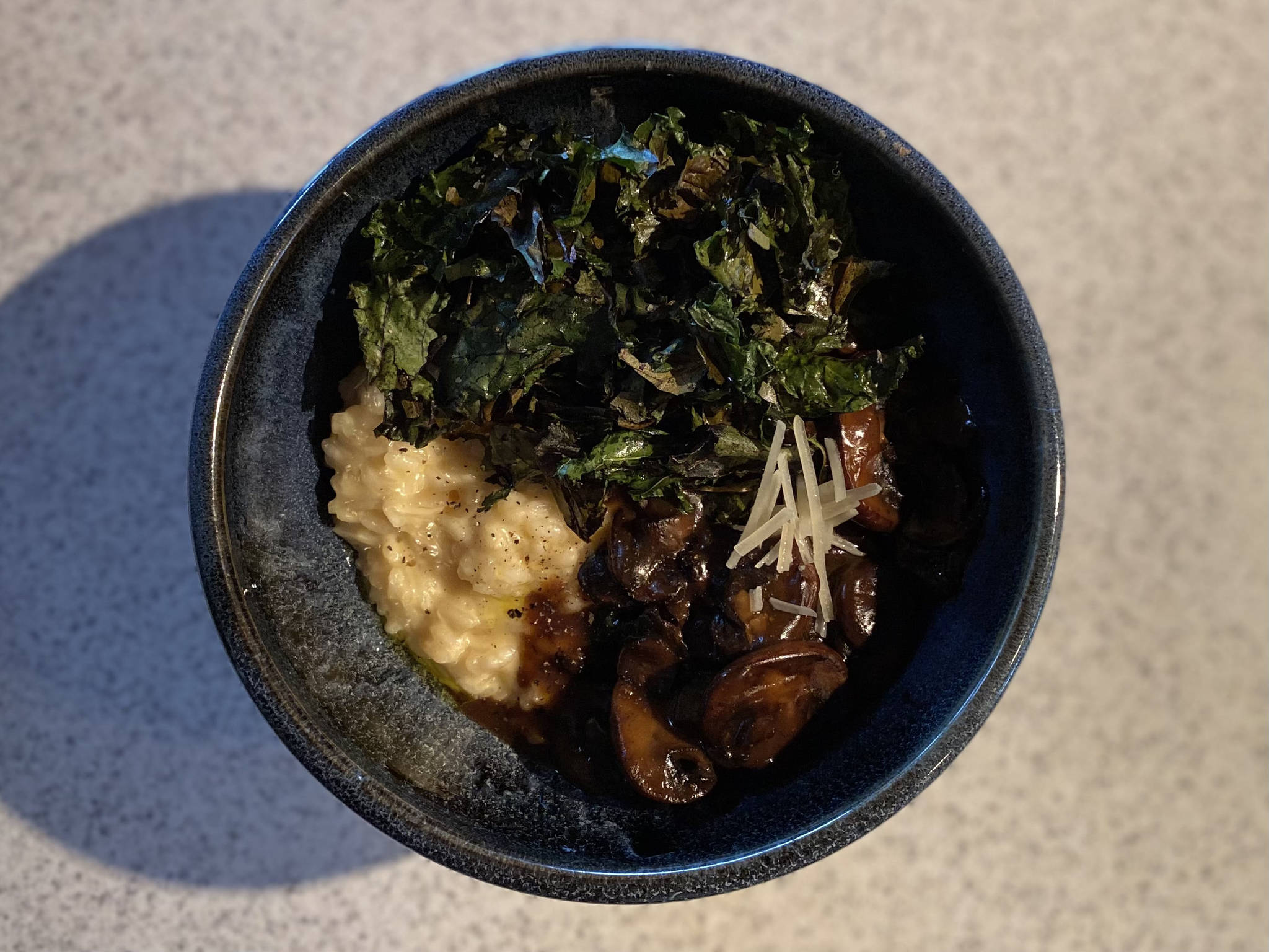 This rich Parmesan risotto makes a creamy base for mushrooms and kale. Photographed July 10, 2021, in Nikiski, Alaska. (Photo by Tressa Dale/Peninsula Clarion)