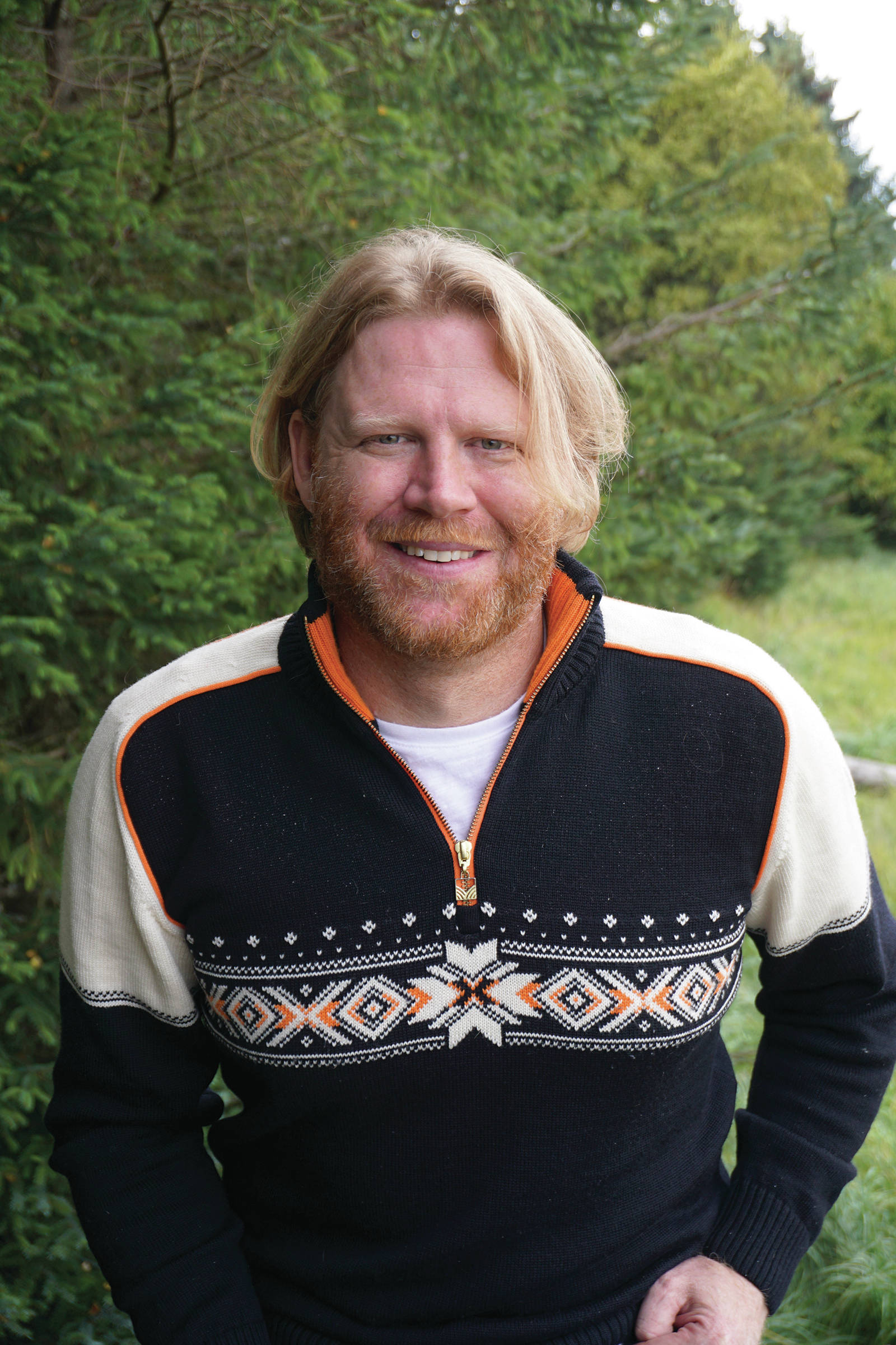 Homer News
Homer City Council candidate Joey Evensen poses for a photo on Sept. 6, 2019, by Beluga Slough at his Homer home.