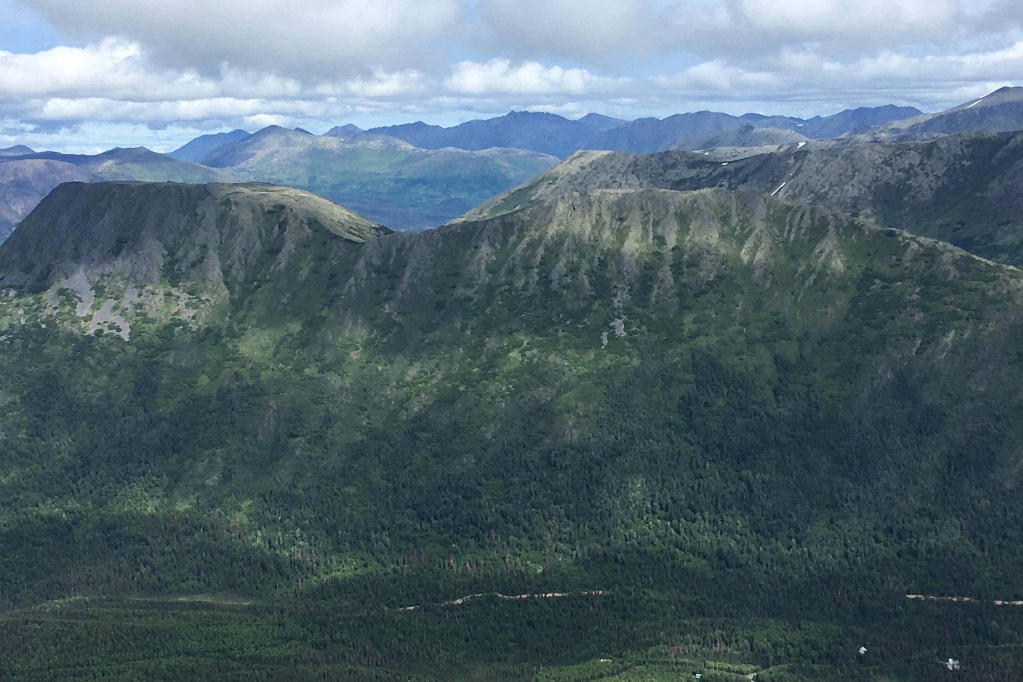 An area cleared for the Cooper Landing bypass project can be seen below Slaughter Ridge in Cooper Landing, Alaska, on July 18, 2020. (Jeff Helminiak/Peninsula Clarion)