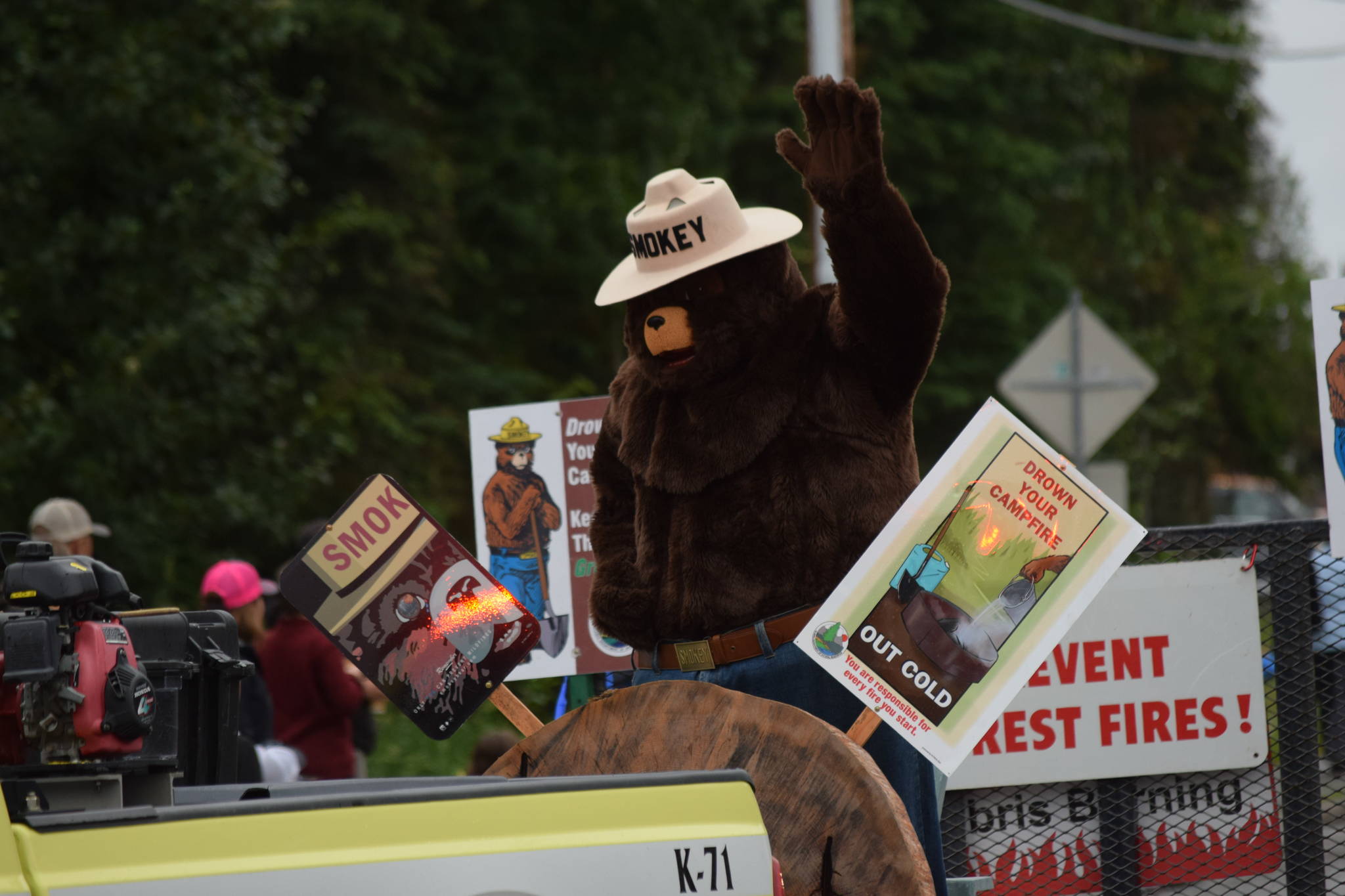 Smokey Bear waves to the crowd from the U.S. Forest Service float during the Soldotna Progress Days parade on Saturday, July 24, 2021. (Camille Botello / Peninsula Clarion)