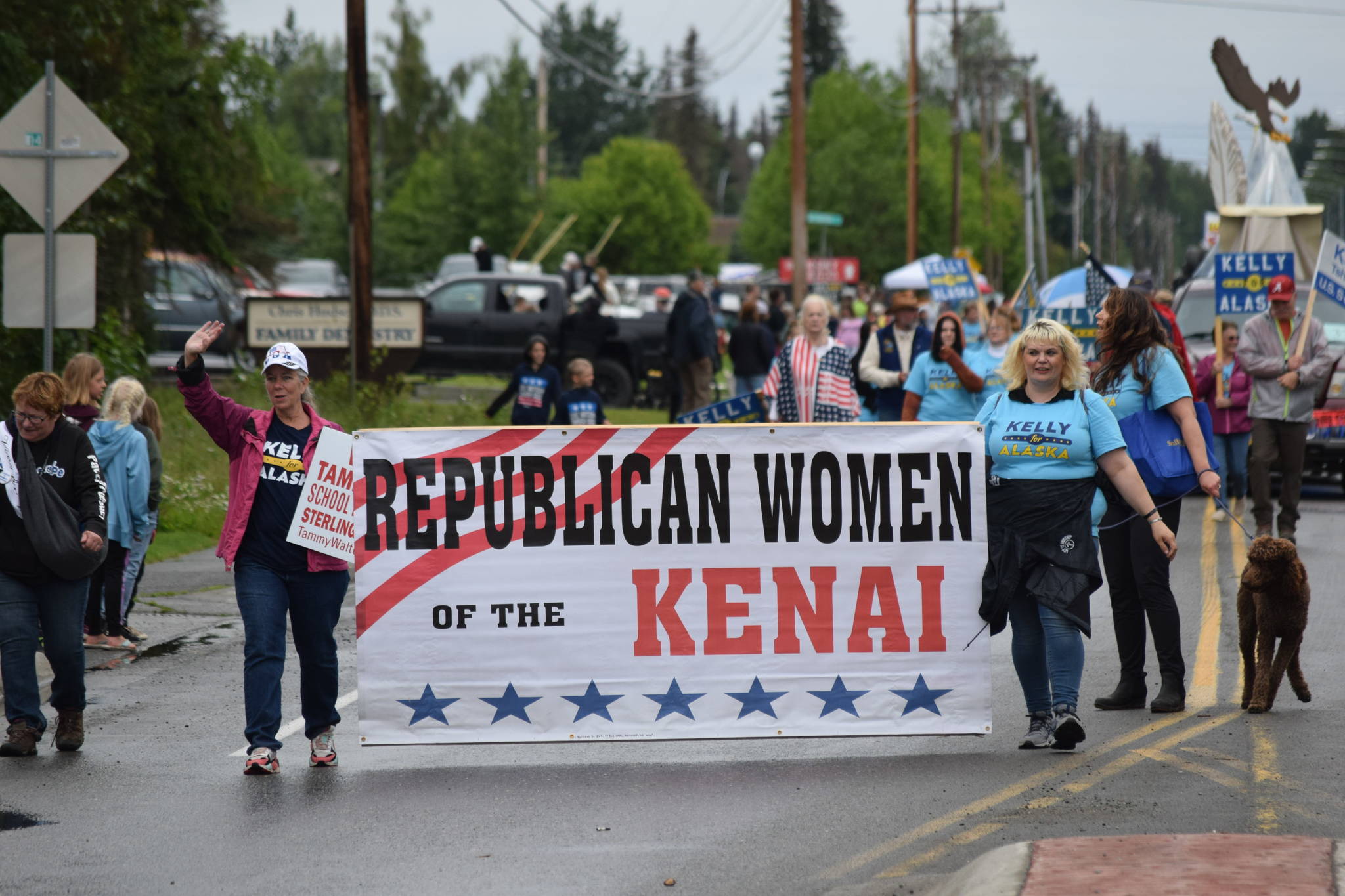 Members of the Republican Women of the Kenai wave to the crowd during the Soldotna Progress Days parade on Saturday, July 24, 2021. (Camille Botello / Peninsula Clarion)