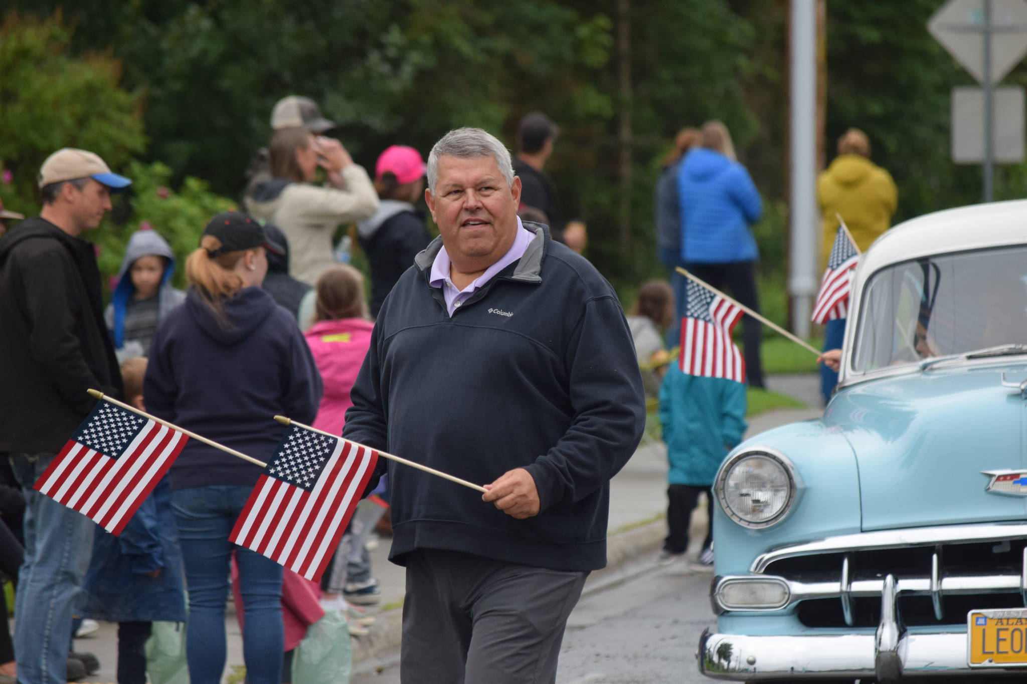 Borough Mayor Charlie Pierce waves to the crowd during the Soldotna Progress Days parade on Saturday, July 24, 2021. (Camille Botello / Peninsula Clarion)