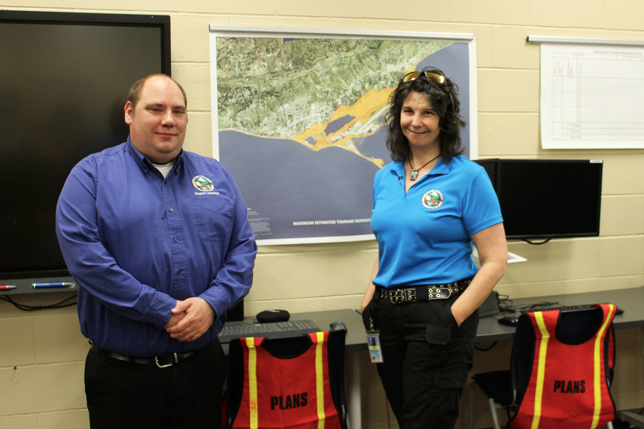 Dan Nelson (left) and Brenda Ahlberg stand at the Kenai Peninsula Borough’s Office of Emergency Management’s Emergency Response Center on Thursday, July 29, 2021 in Soldotna, Alaska. (Ashlyn O’Hara/Peninsula Clarion)