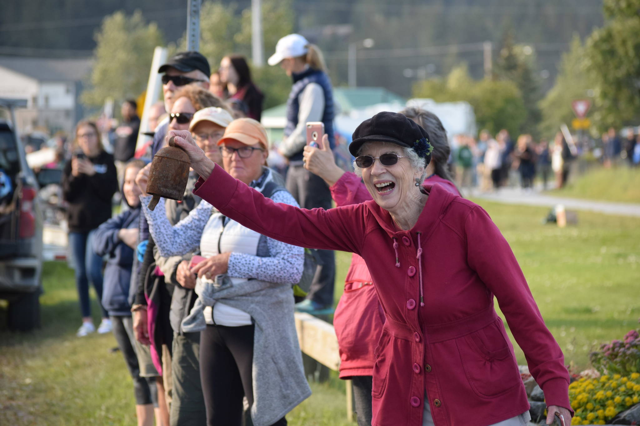 The crowd cheers as Olympic gold medalist Lydia Jacoby passes through Seward during her celebratory parade on Thursday, August 5, 2021. (Camille Botello / Peninsula Clarion)