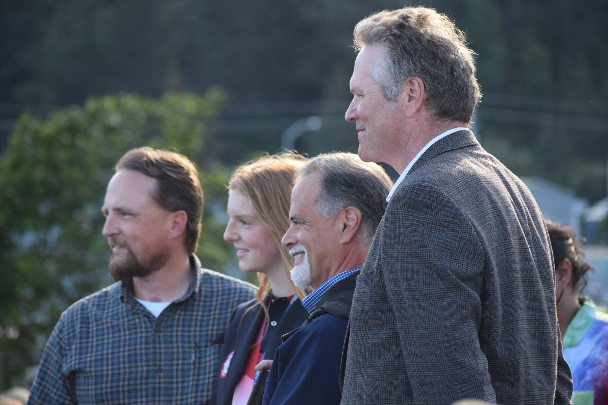 State Rep. Ben Carpenter (left), Lydia Jacoby (second from left), State Sen. Peter Micciche (second from right) and Gov. Mike Dunleavy (right) pose for a picture on Thursday, Aug. 5, 2021 in Seward, Alaska. (Ashlyn O'Hara/Peninsula Clarion)
