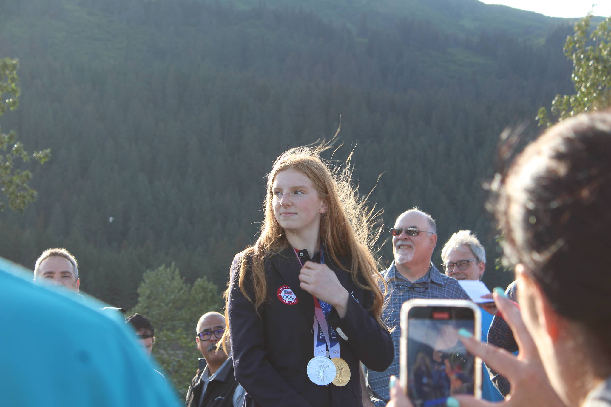 Olympic gold medalist Lydia Jacoby waves to the crowd in Seward during her celebratory parade on Thursday, August 5, 2021. (Ashlyn O’Hara/Peninsula Clarion)