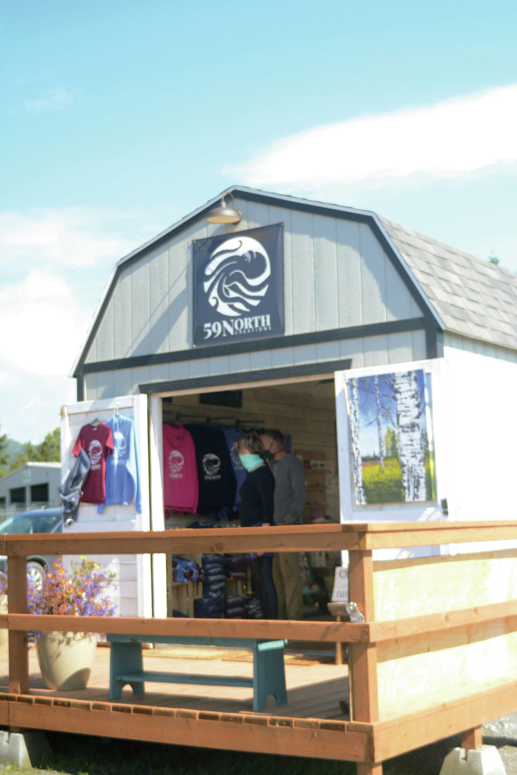 Customers browse in Tracy Hansen’s Ocean Drive shop, 59 North, on Tuesday, Aug. 10, 2021, in Homer, Alaska. (Photo by Michael Armstrong/Homer News)