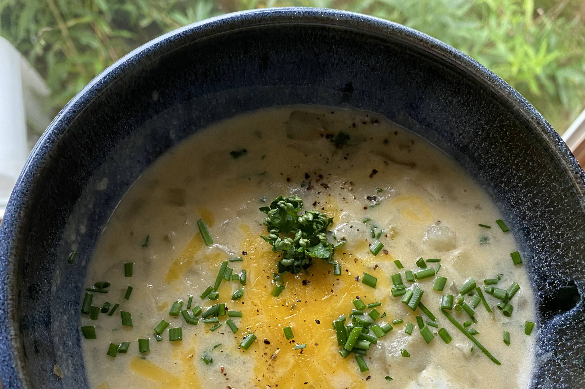 This potato corn chowder takes 10 minutes to prepare and can be customized with different toppings to satisfy everyone at the table. (Photo by Tressa Dale/Peninsula Clarion)