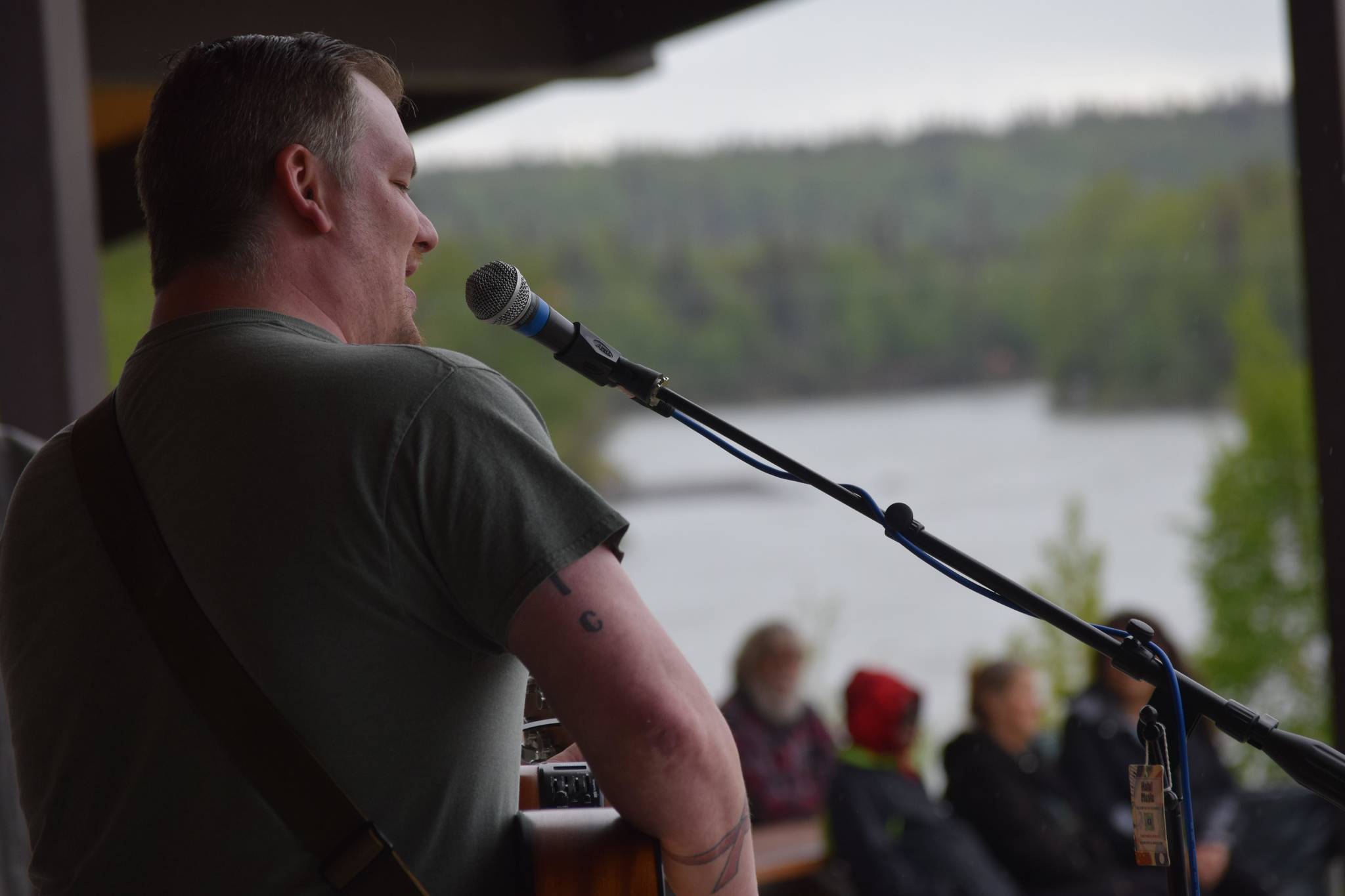 Shonathin Hoskins opens at the season’s first Levitt Amp music series in Soldotna Creek Park on Wednesday, June 2, 2021. An audience filled half the lawn and the majority of the beer and wine garden as others purused the food and artisan vendors. (Camille Botello / Peninsula Clarion)