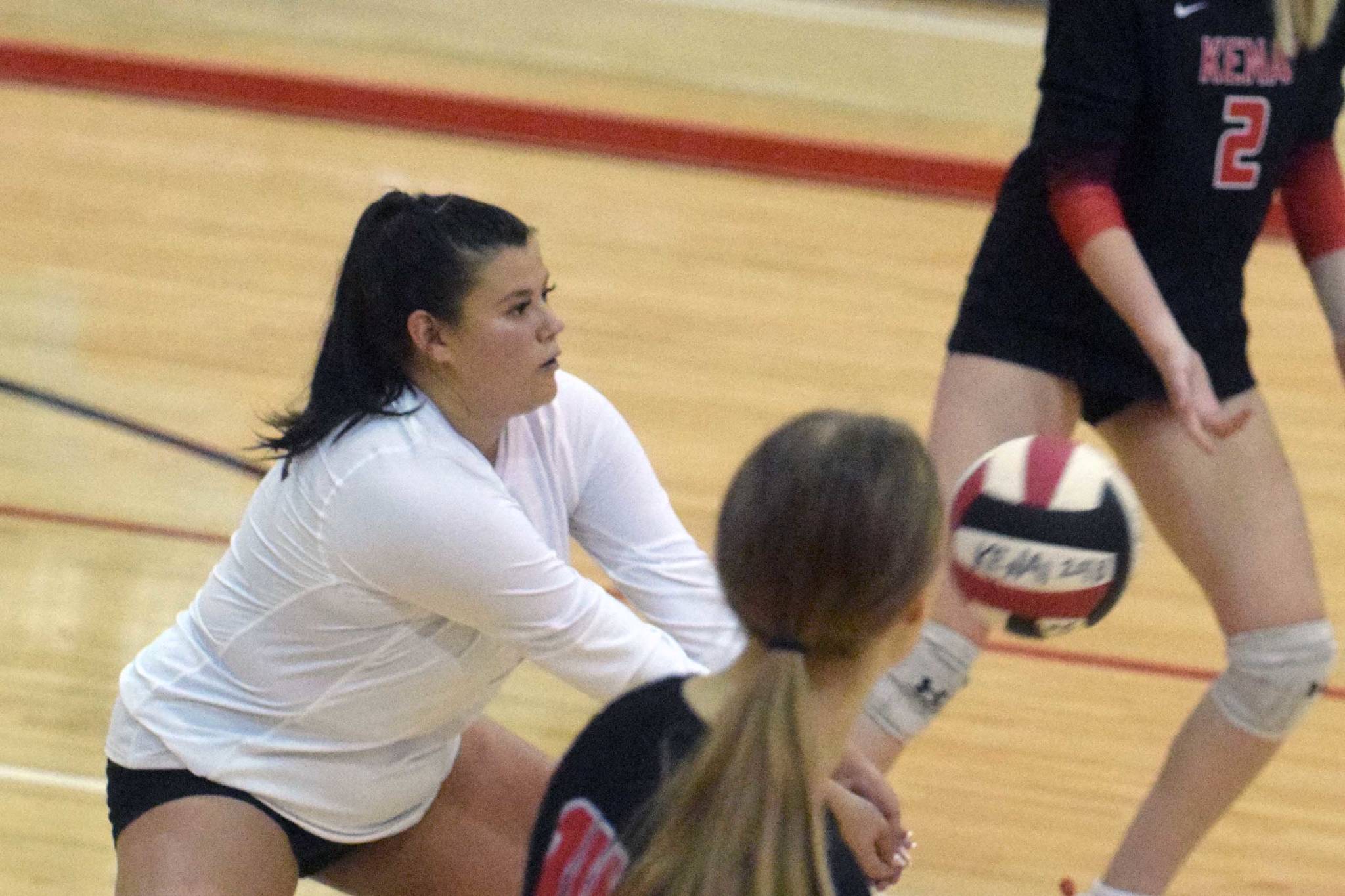 Kenai Central's Valerie Villegas digs up a ball against Sitka on Wednesday, Aug. 25, 2021, at Kenai Central High School in Kenai, Alaska. (Photo by Jeff Helminiak/Peninsula Clarion)