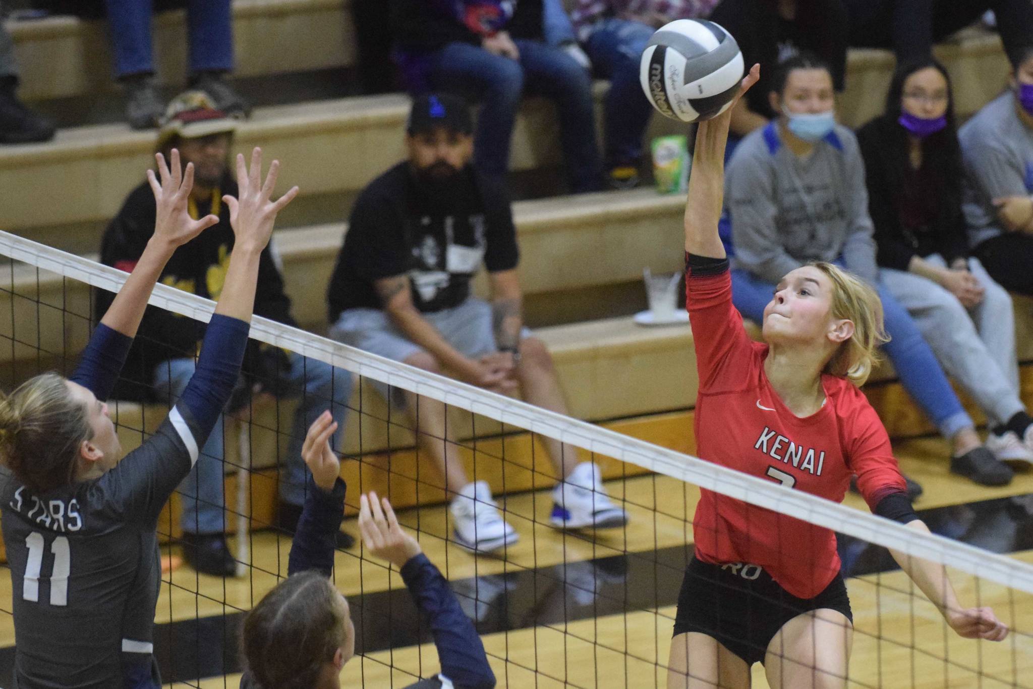 Kenai Central's Cali Holmes attacks Soldotna in the final of the Shayna Pritchard Memorial Volleyball Tournament on Saturday, Aug. 28, 2021, at Nikiski High School in Nikiski, Alaska. (Photo by Jeff Helminiak/Peninsula Clarion)