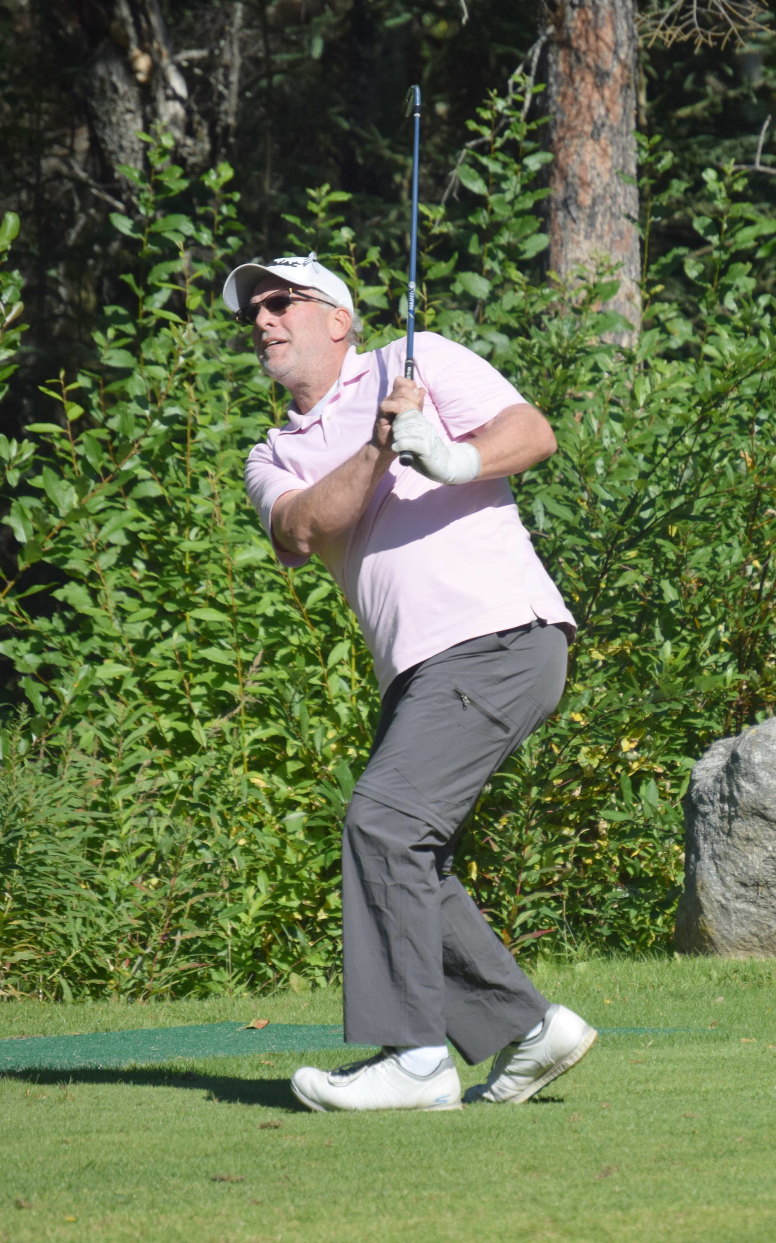 Birch Ridge pro Rich Lundahl tees off on the 18th hole Sunday, Aug. 29, 2021, during the final round of the Kenai Peninsula Open at Birch Ridge Golf Course in Soldotna, Alaska. (Photo by Jeff Helminiak/Peninsula Clarion)