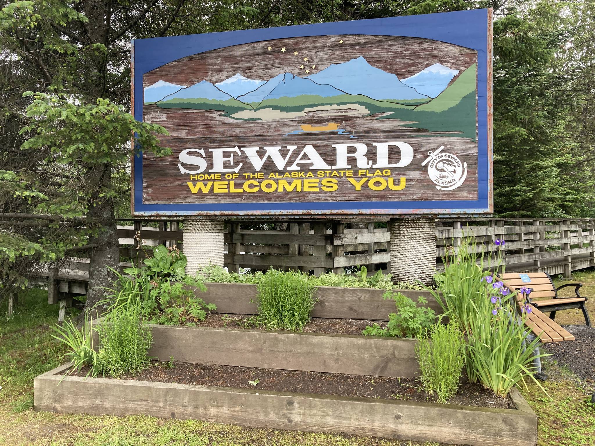 A sign welcomes visitors on July 7, 2021, in Seward, Alaska. Due to a rise in the number of COVID-19 cases, school in Seward and other areas of the eastern peninsula switched to universal indoor masking this week. (Photo by Jeff Helminiak/Peninsula Clarion)