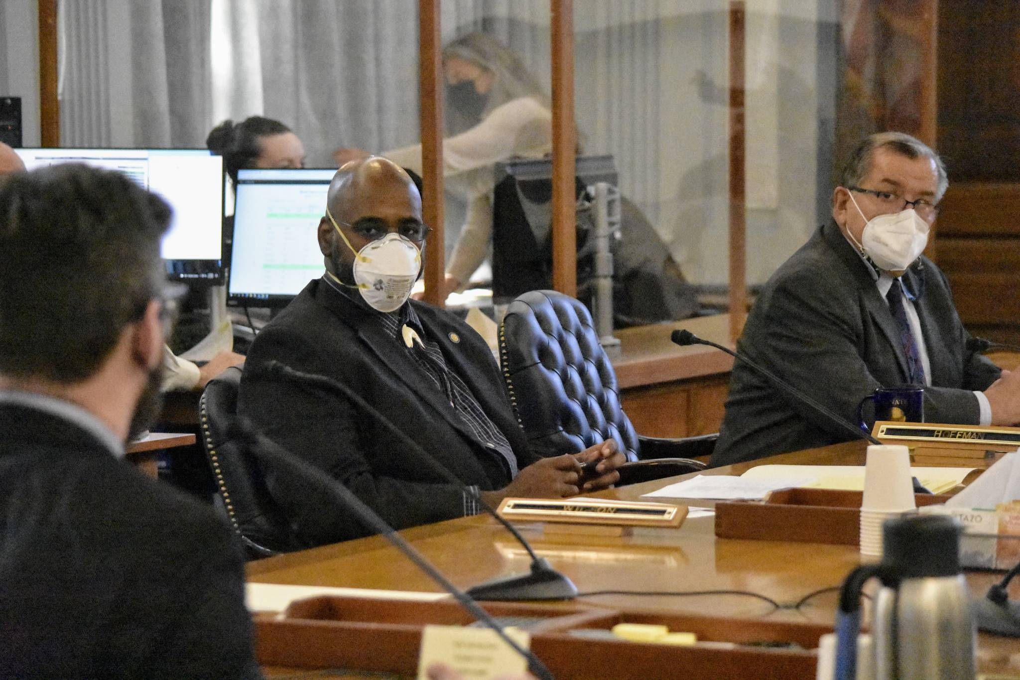 Sens. David Wilson, R-Wasilla, center, and Lyman Hoffman, D-Bethel, right, put questions to Office of Management and Budget Director Neil Steininger during a meeting of the Senate Finance Committee on Wednesday, Sept. 1, 2021. The Legislature’s third special session of the year is dealing mostly with budget issues despite having been called to bring resolution to the state’s fiscal deficit. (Peter Segall / Juneau Empire)