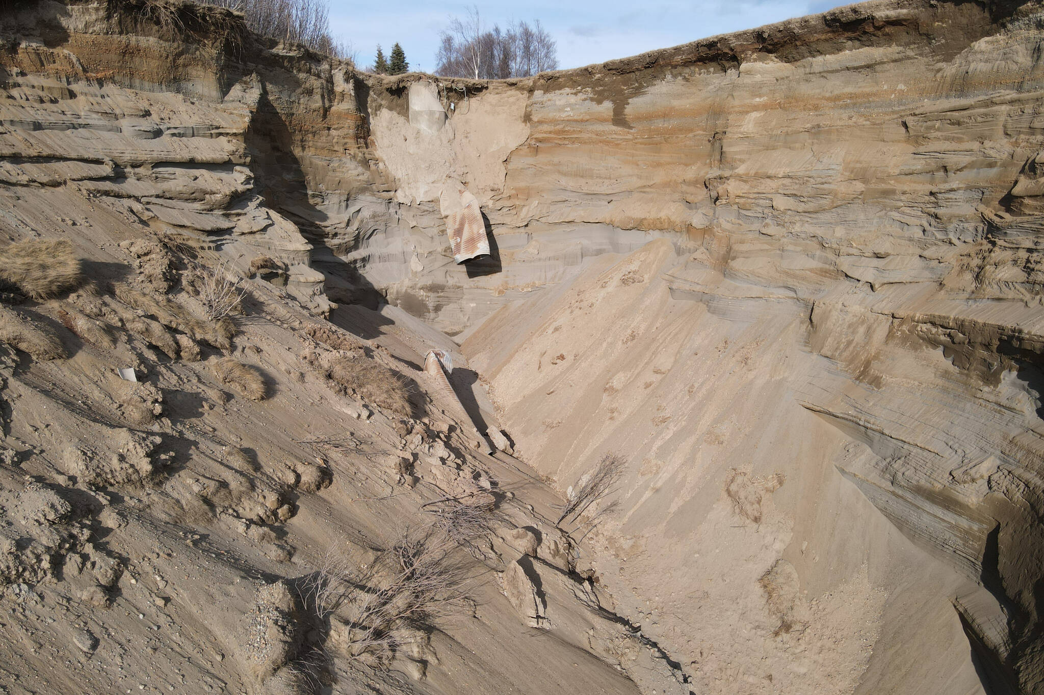 Photo courtesy City of Kenai 
Erosion due to a failing storm water pipe can be seen near Bryson Avenue in Kenai, Alaska.