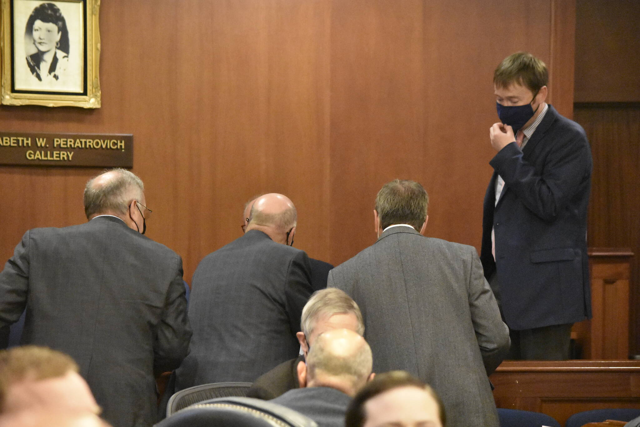 Peter Segall / Juneau Empire 
Members of the Alaska House of Representatives consult staff during an at ease during floor debate on Aug. 31, in the middle of the Alaska State Legislature’s third special session of the year. Gov. Mike Dunleavy said another session is likely, but didn’t say when or where it would be held.