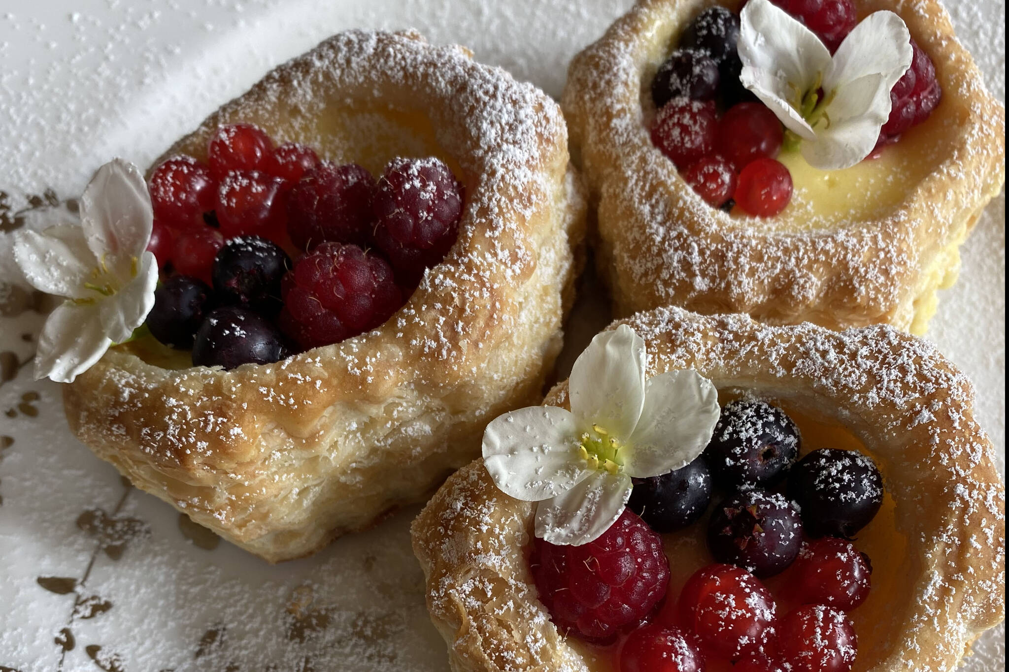 Homemade lemon curd and fruit are an easy way to fill puff pastry tart shells on the fly. (Photo by Tressa Dale/Peninsula Clarion)