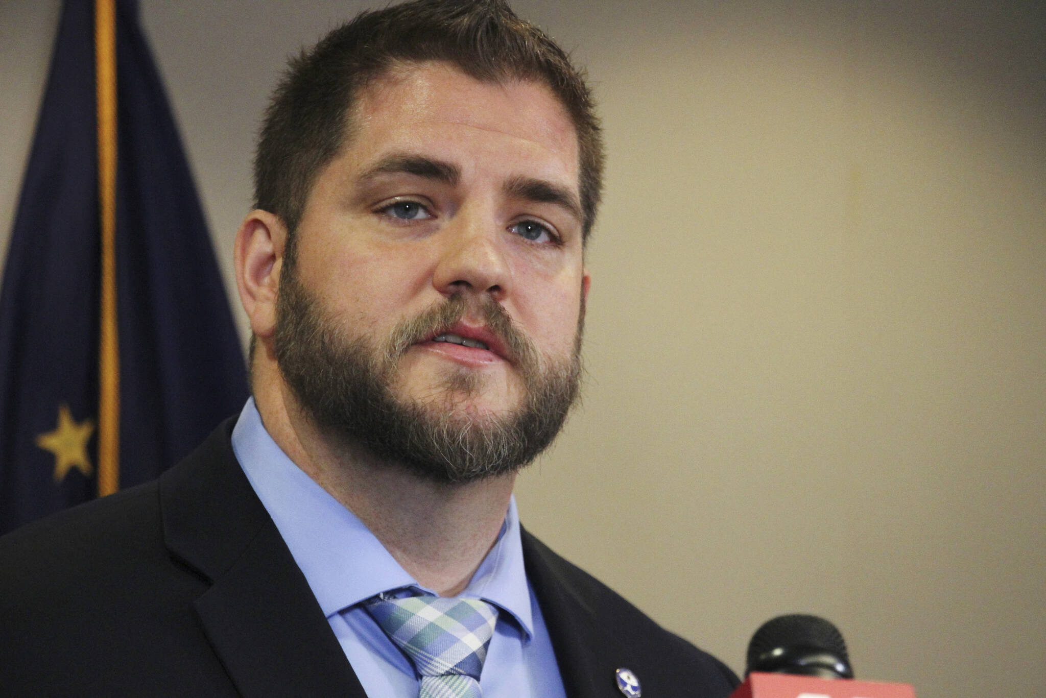 In this Monday, March 2, 2020, file photo, Alaska Department of Health and Social Services Commissioner Adam Crum addresses the state’s coronavirus preparedness at a news conference in Anchorage, Alaska. (AP Photo/Mark Thiessen, File)