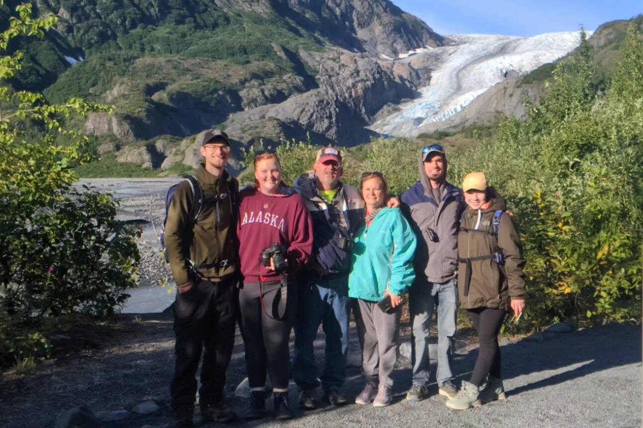 Michael, Sarah, Pete, Becky, Will and Margaret take a picture in front of Exit Glacier in Seward on Aug. 21.