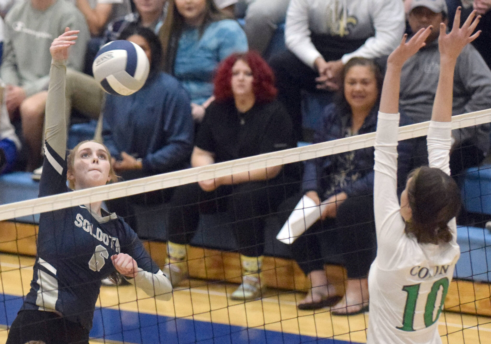 Soldotna’s Chloe Armstrong attacks Colony’s Alyvia Davis on Thursday, Sept. 9, 2021, at Soldotna High School in Soldotna, Alaska. (Photo by Jeff Helminiak/Peninsula Clarion)