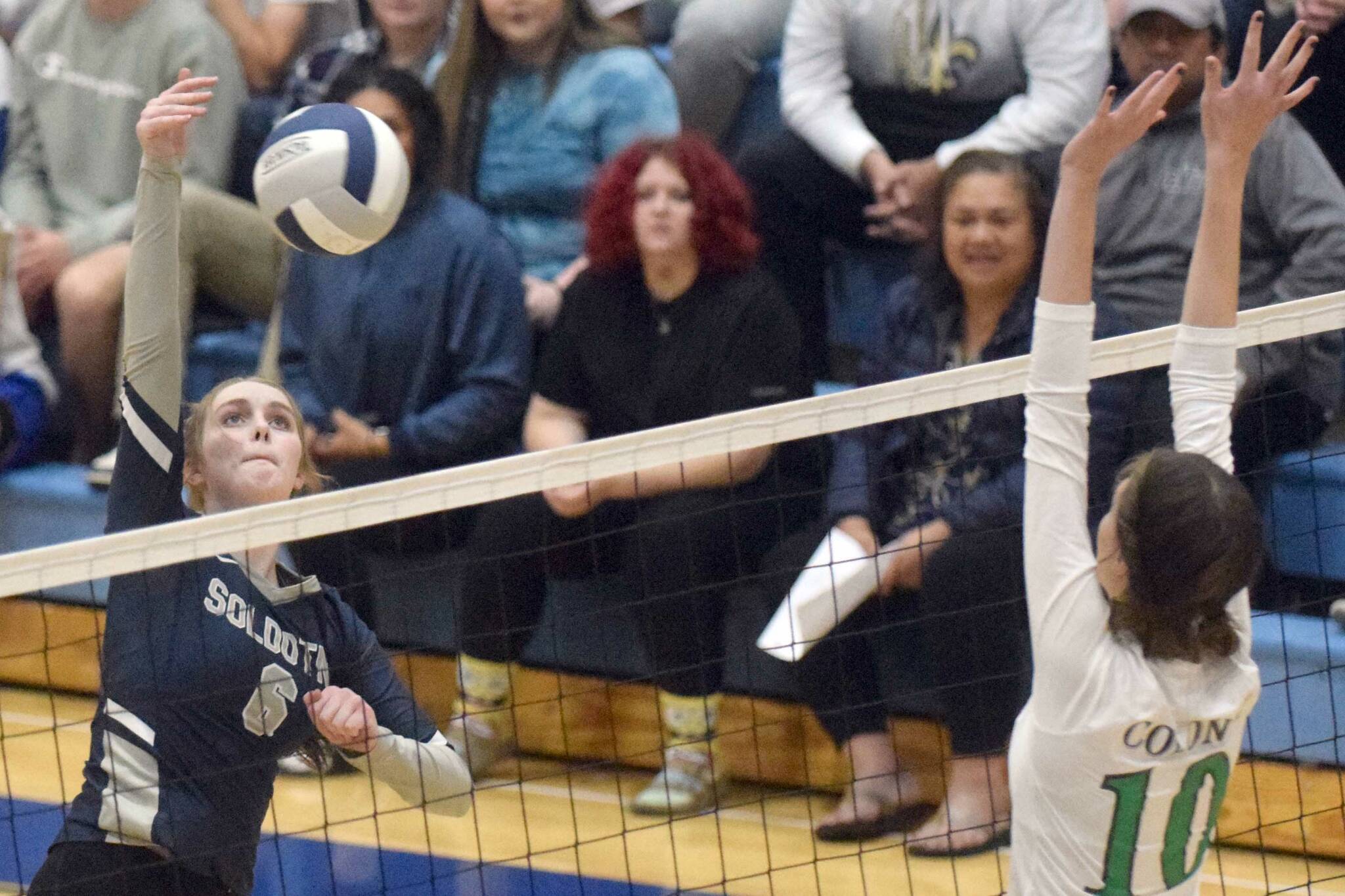 Soldotna's Chloe Armstrong attacks Colony's Alyvia Davis on Thursday, Sept. 9, 2021, at Soldotna High School in Soldotna, Alaska. (Photo by Jeff Helminiak/Peninsula Clarion)