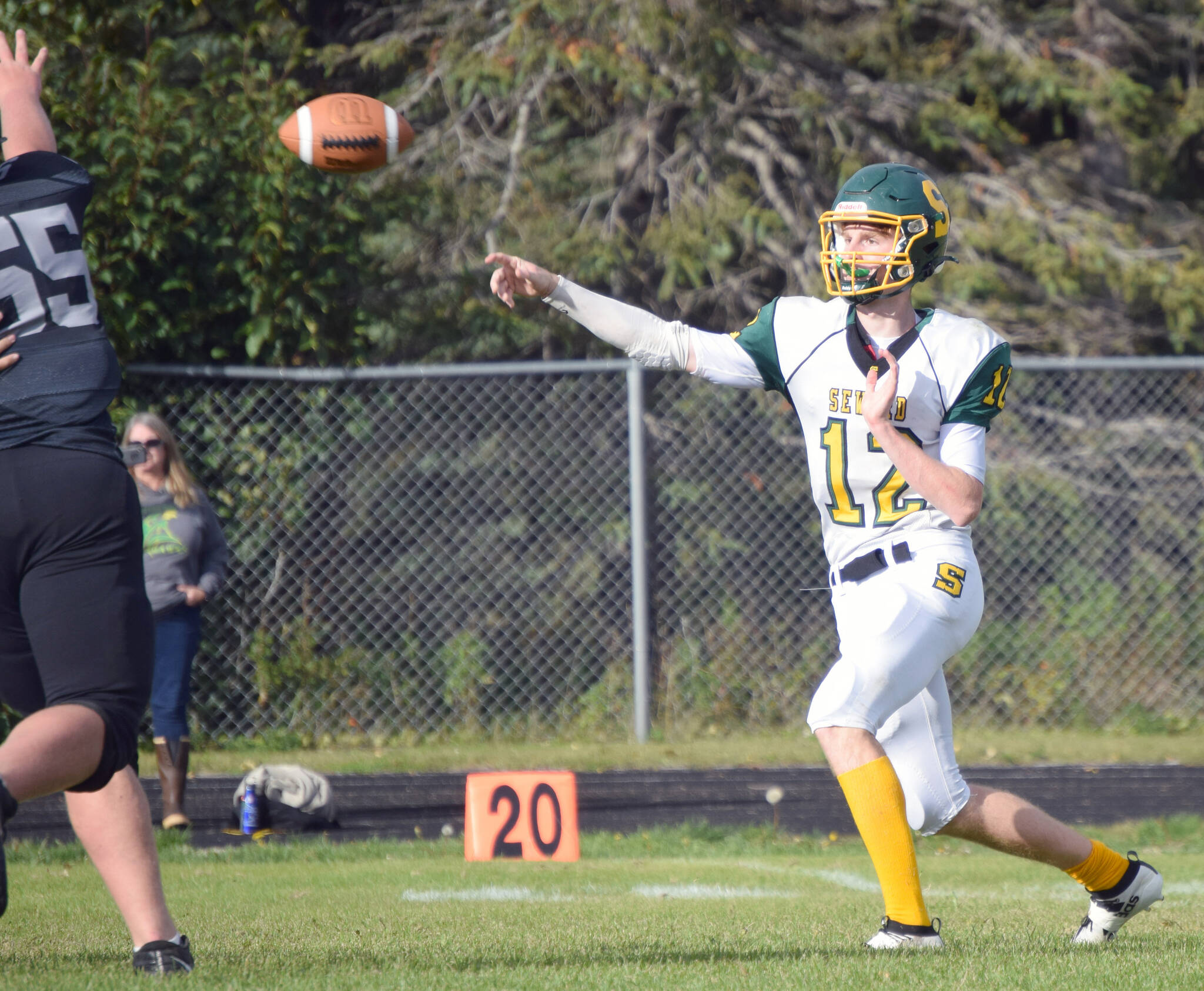 Seward’s Tommy Cronin cuts loose a pass Friday, Sept. 10, 2021, at Nikiski High School in Nikiski, Alaska. (Photo by Jeff Helminiak/Peninsula Clarion)