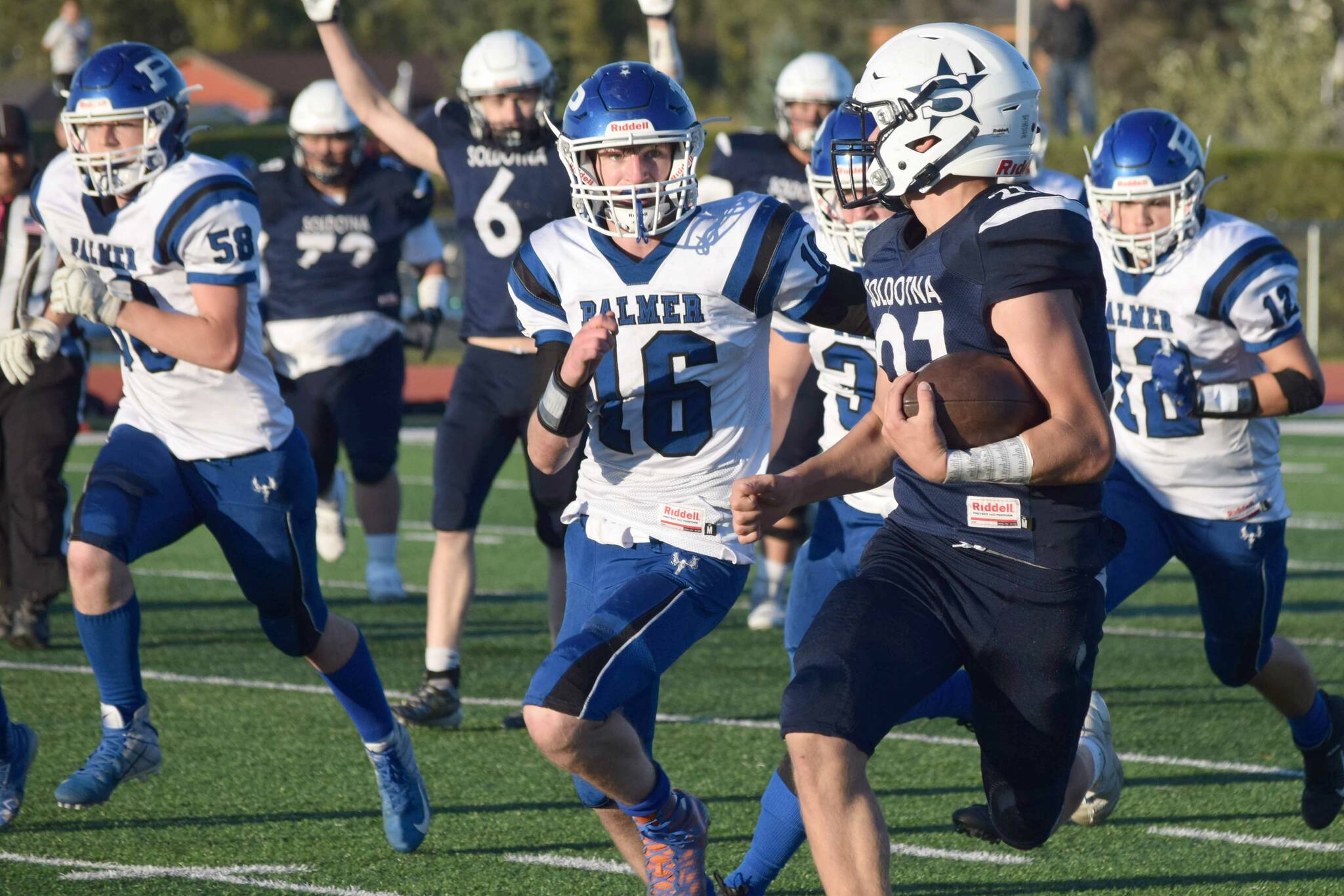 Brayden Taylor runs the ball to the end zone during Soldotna High's homecoming footall game at Justin Maile Field in Soldotna, Alaska on Friday, Sept. 10, 2021. (Camille Botello/Peninsula Clarion)