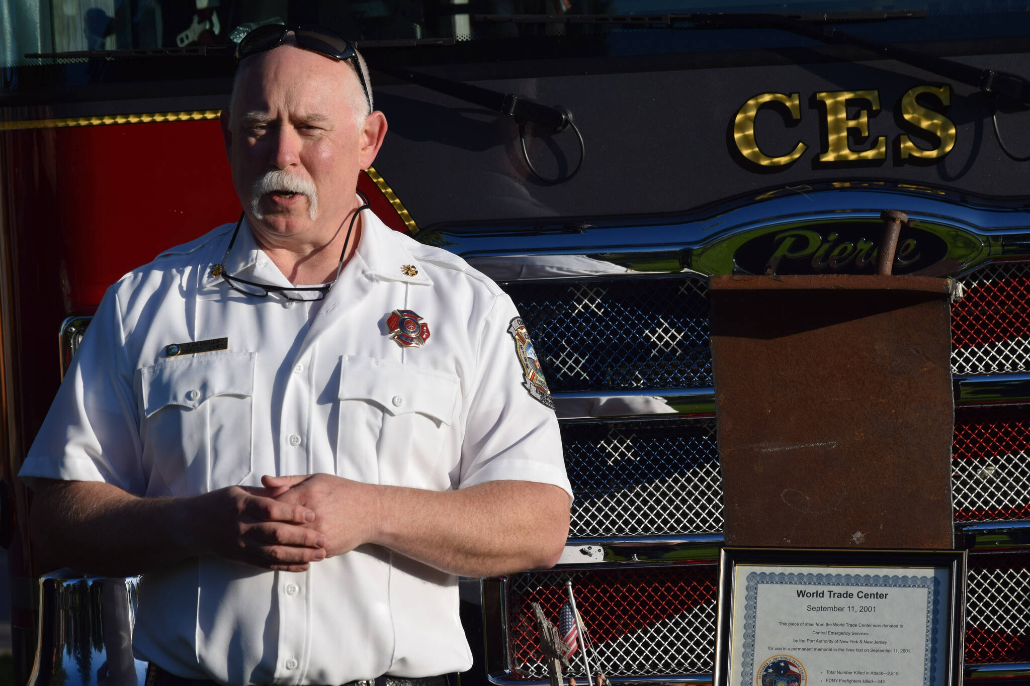 Deputy Chief Dan Grimes speaks at Central Emergency Services in Soldotna during the 20th memorial service of the 9/11 terrorist attacks on Saturday, Sept. 11, 2021. (Camille Botello/Peninsula Clarion)
