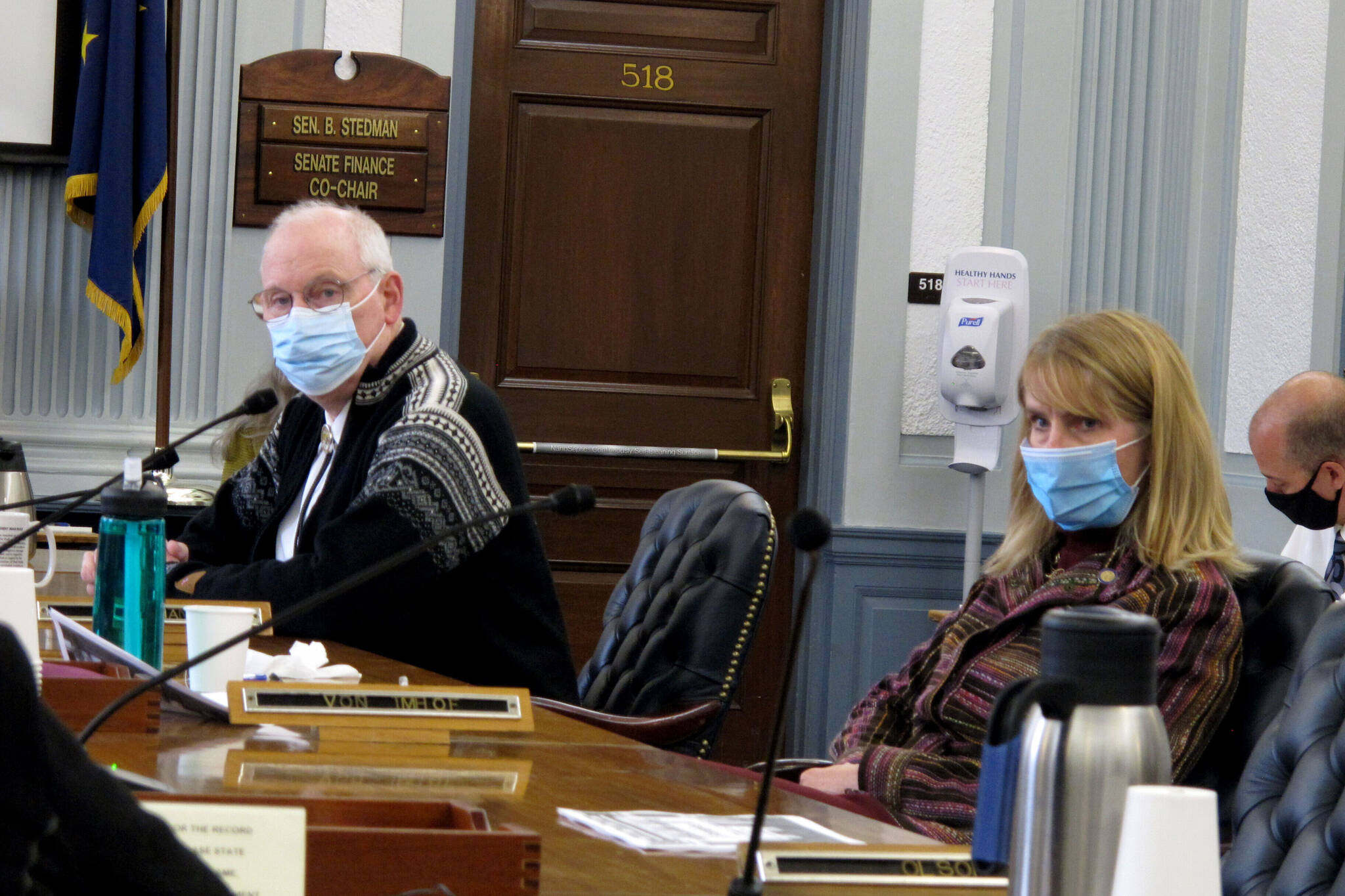 Alaska state Sens. Bert Stedman, left, and Natasha von Imhof listen during a Senate Finance Committee hearing on Saturday, Sept. 11, 2021, in Juneau, Alaska. Legislators are meeting in a special session, which is expected to end Tuesday. (AP Photo/Becky Bohrer)