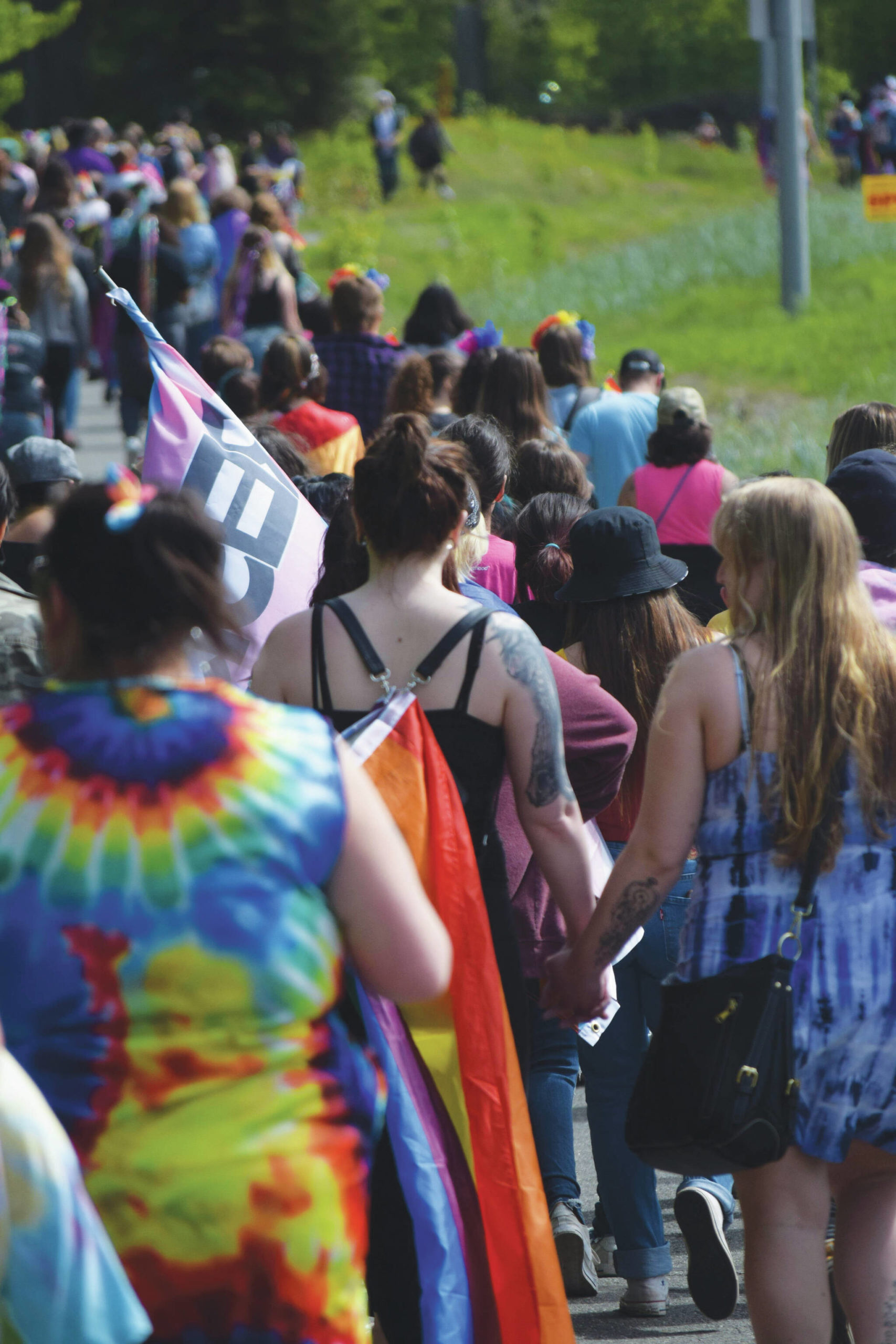 A group spanning the length of five blocks marches in downtown Soldotna, Alaska, to celebrate Pride Month on Saturday, June 12, 2021. (Camille Botello/Peninsula Clarion)