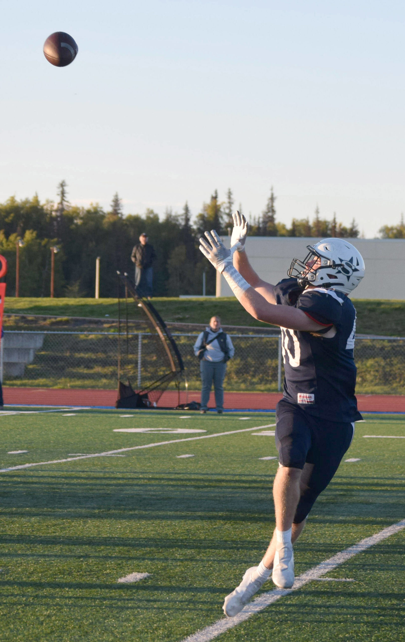 Dylan Dahlgren receives a long pass to score a touchdown during Soldotna High’s homecoming football game at Justin Maile Field in Soldotna, Alaska, on Friday, Sept. 10, 2021. (Camille Botello/Peninsula Clarion)