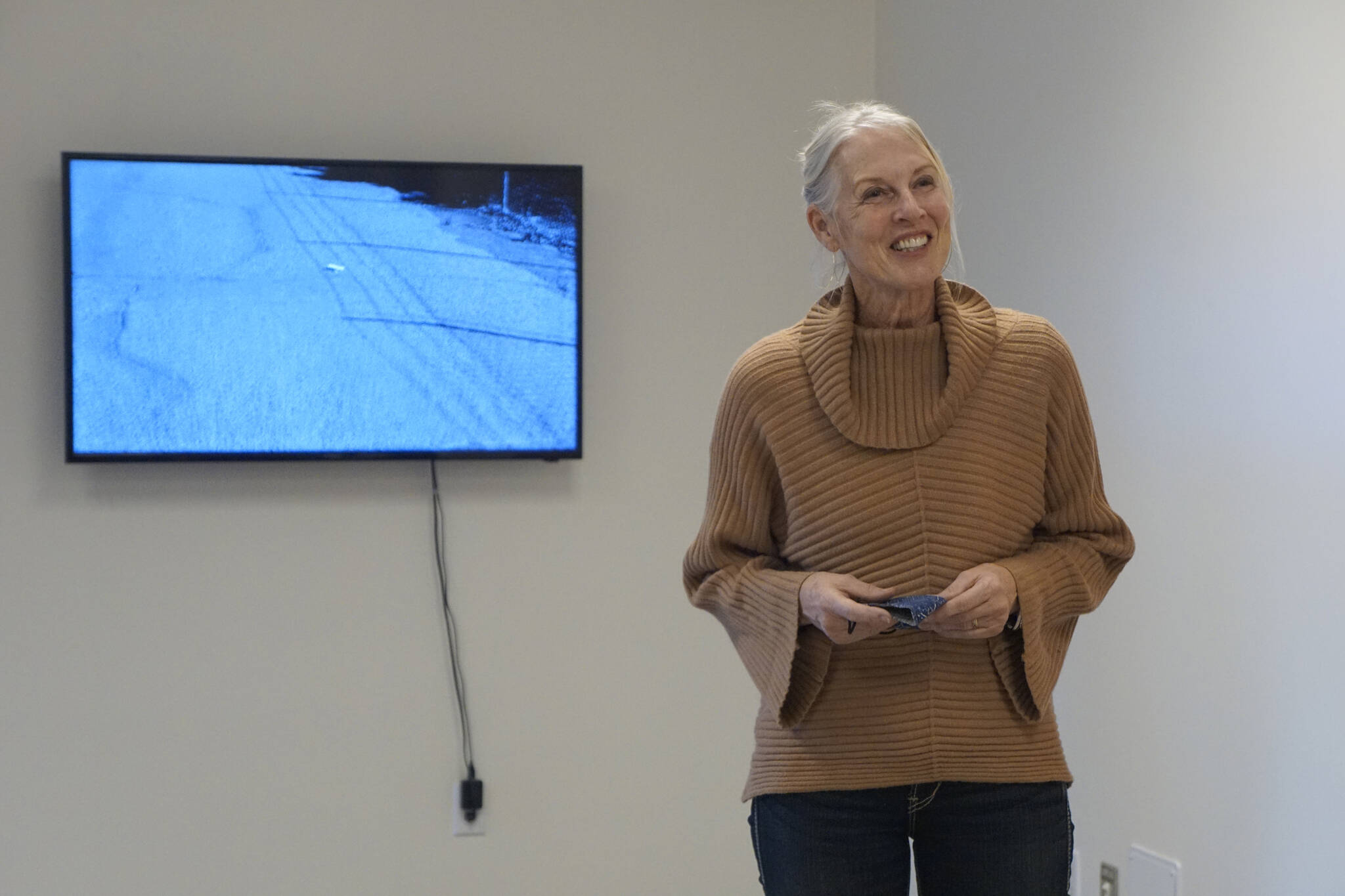 Sheryl Maree Reily speaks last Friday, Sept. 17, 2021, about the Homer Drawdown Peatland exhibit showing at the Pratt Museum & Park in Homer, Alaska. Reily was a Bunnell Street Arts Center Artist in Residence who did an installation and video for the exhbit. (Photo by Michael Armstrong/Homer News)