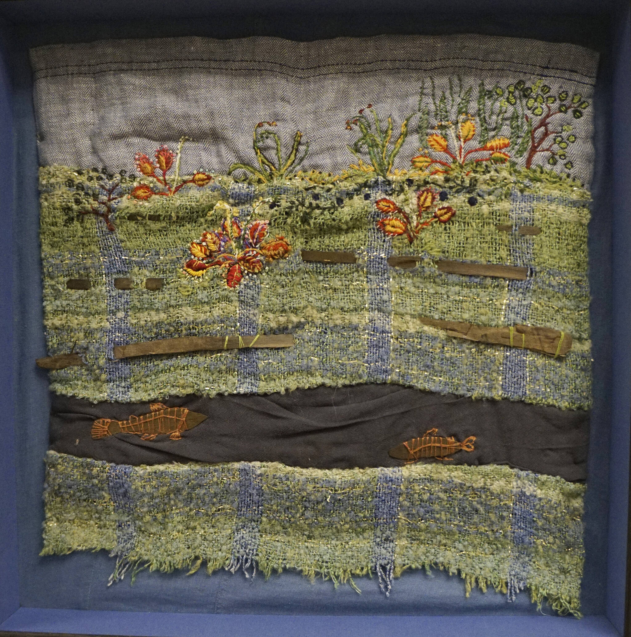 Coowe Walker’s tapestry includes petrified peat. It’s part of the Homer Drawdown Peatland exhibit showing at the Pratt Museum & Park through Oct. 10, 2021, in Homer, Alaska. (Photo by Michael Armstrong/Homer News)