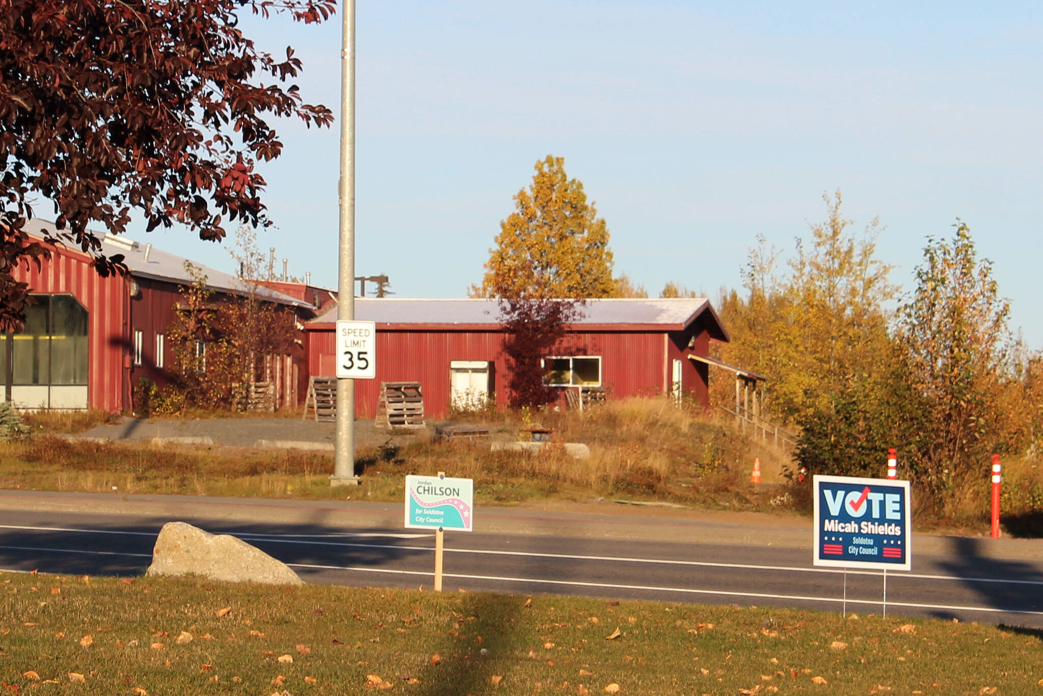 Signs show support for Soldotna City Council candidates at the intersection of the Sterling Highway and the Kenai Spur Highway on Thursday, Sept. 30, 2021. (Ashlyn O’Hara/Peninsula Clarion)