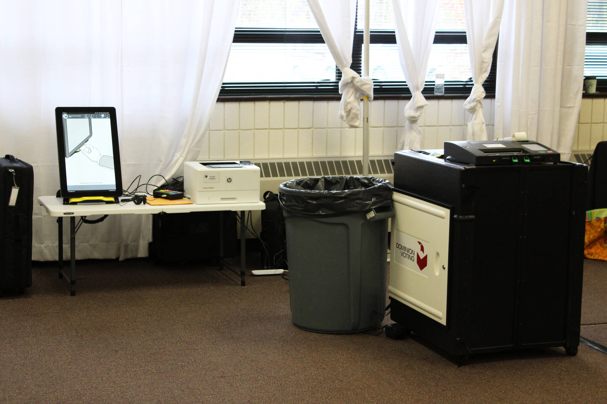 Voting equipment is set up at a polling location at the Soldotna Regional Sports Complex on Tuesday, Oct. 5, 2021 in Soldotna, Alaska. (Ashlyn O’Hara/Peninsula Clarion)