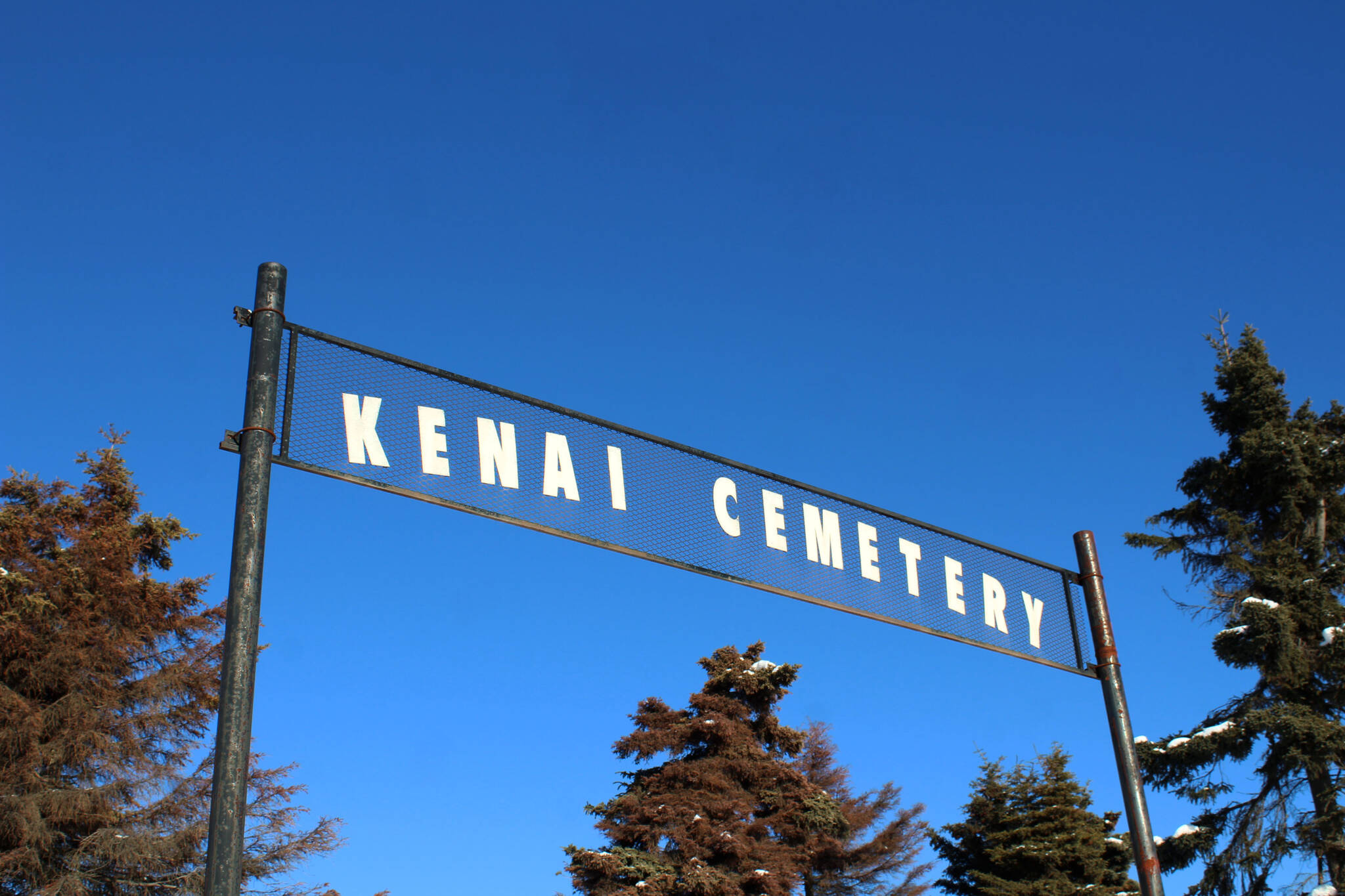 The entrance to the Kenai Municipal Cemetery is seen on Thursday, Feb. 25 in Kenai, Alaska. (Ashlyn O’Hara/Peninsula Clarion)