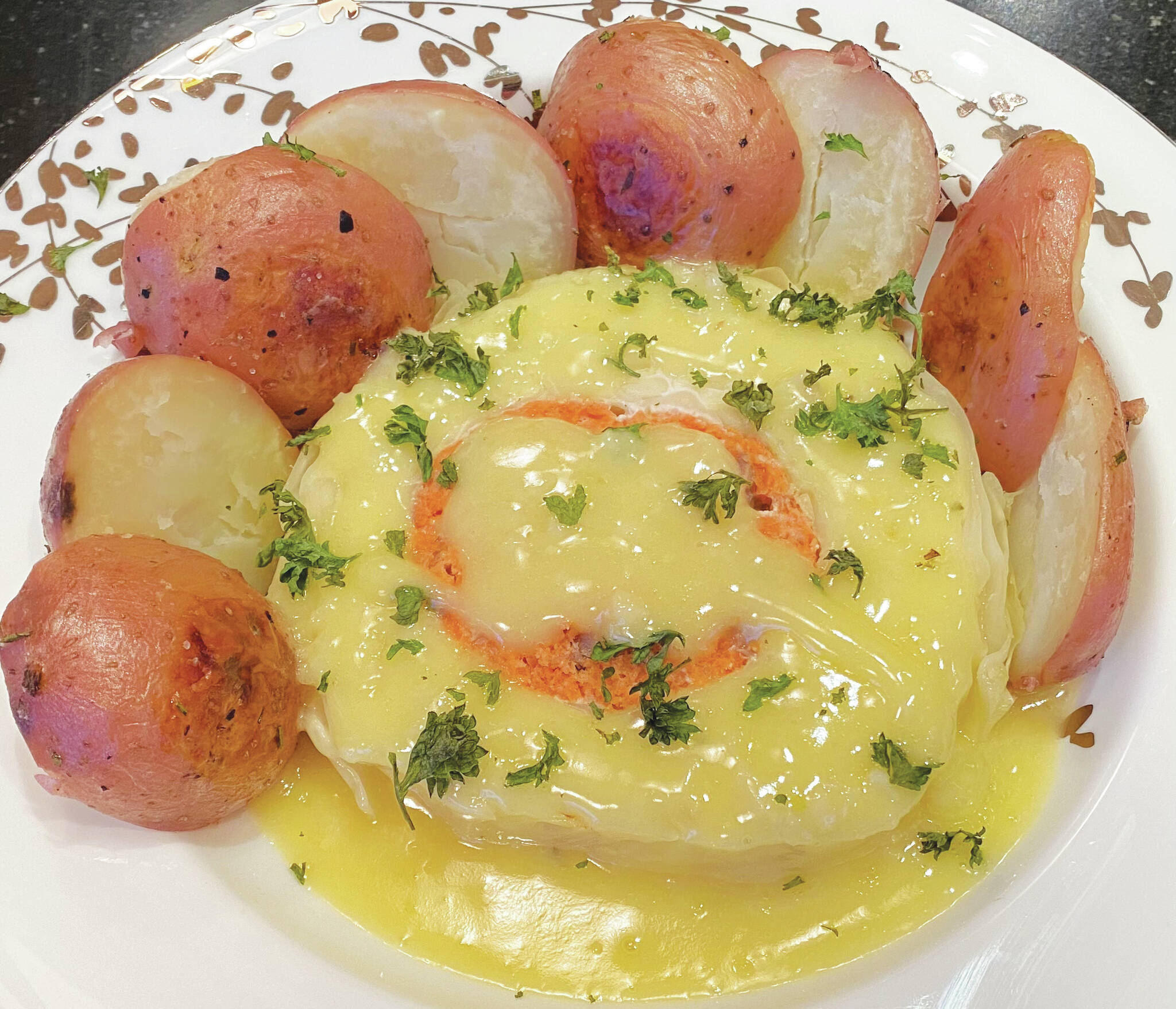 Cabbage, potatoes, salmon and an assortment of pantry staples make for a culinary challenge. (Photo by Tressa Dale/Peninsula Clarion)