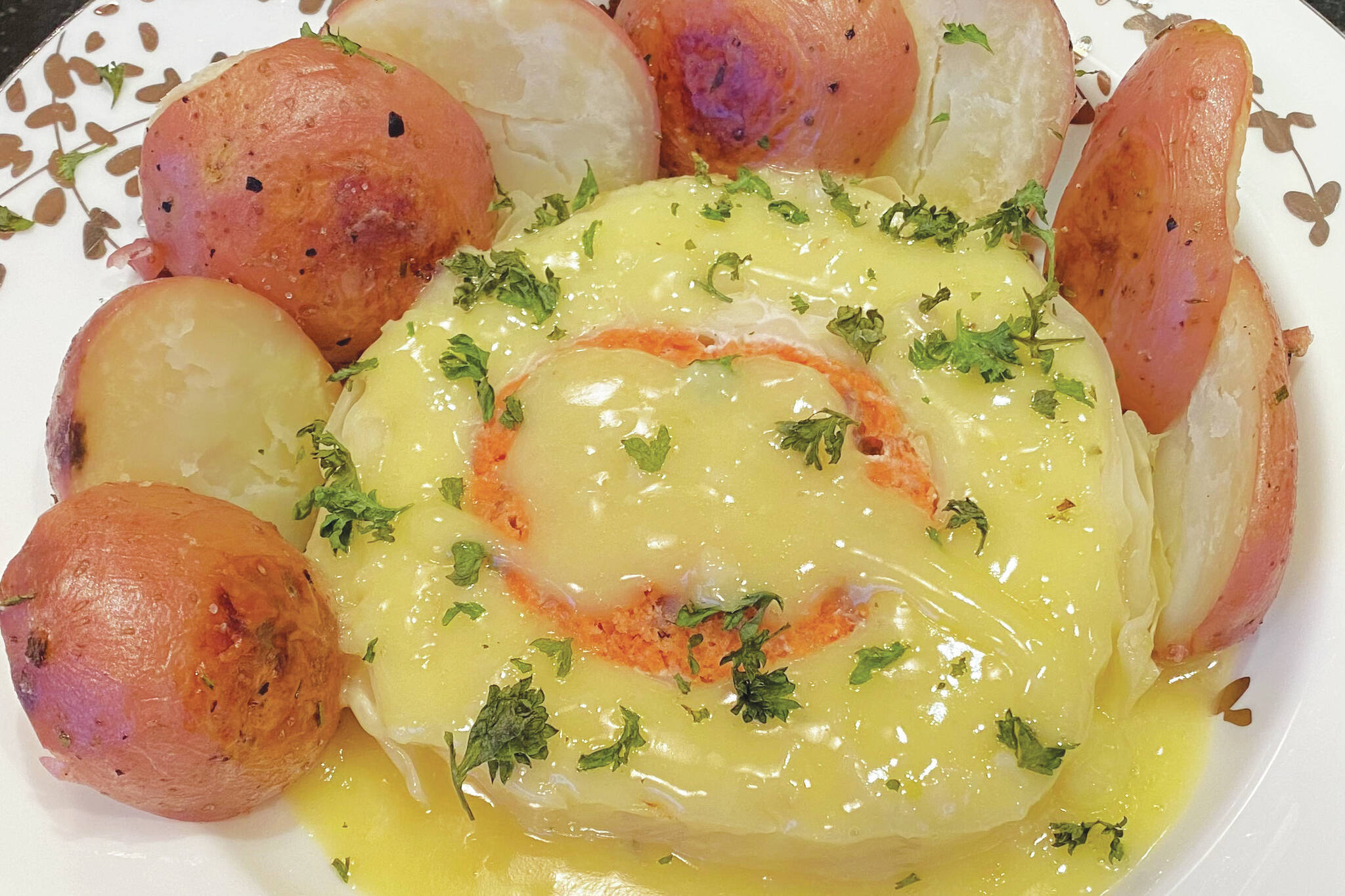 Cabbage, potatoes, salmon and an assortment of pantry staples make for a culinary challenge. (Photo by Tressa Dale/Peninsula Clarion)