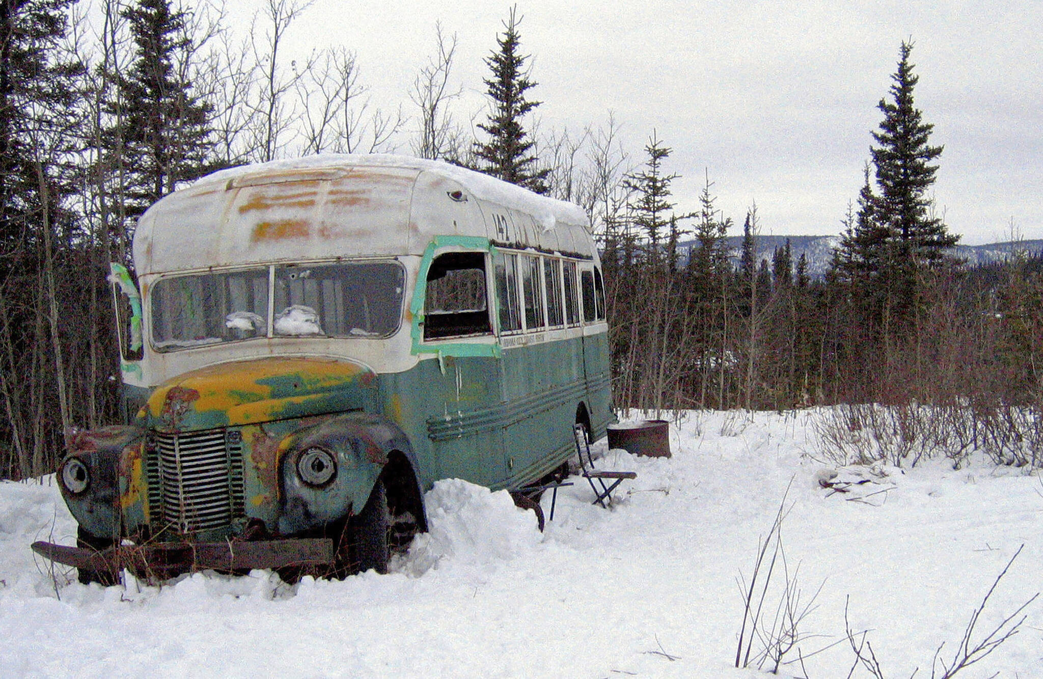 In this March 21, 2006, file photo, is the abandoned bus where Christopher McCandless starved to death in 1992 near Healy, Alaska. The bus that people sometimes embarked on deadly pilgrimages to Alaska’s backcountry to visit can now safely be viewed at the University of Alaska Fairbanks while it undergoes preservation work. The bus was moved to the university’s engineering facility in early Oct. 2021, while it’s being prepared for outdoor display at the Museum of the North, Fairbanks television station KTVF reported. (AP Photo/Jillian Rogers, File )