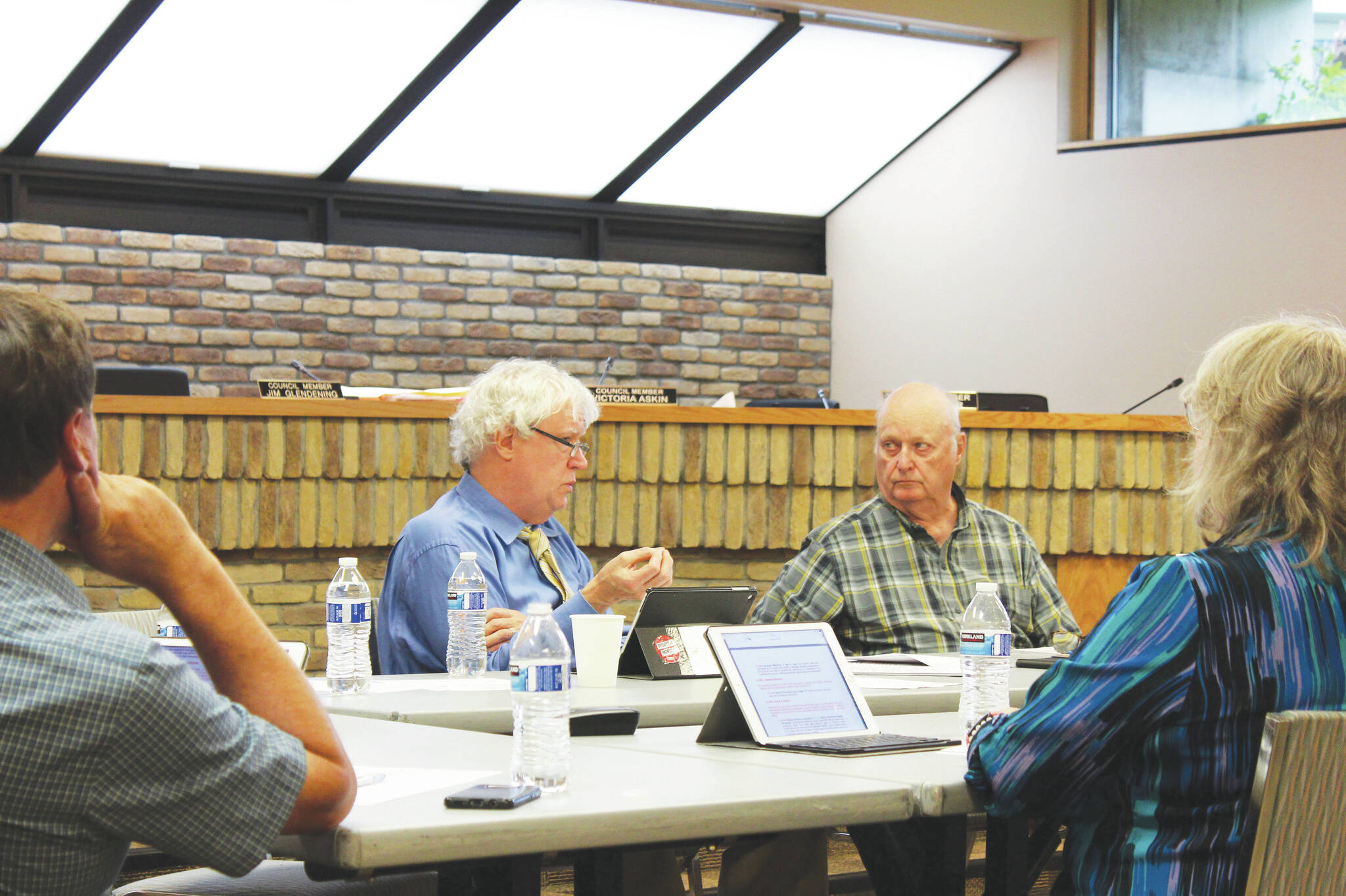 Kenai Vice Mayor and council member Bob Molloy (center), council member Jim Glendening (right), council member Victoria Askin (far right), and council member Henry Knackstedt (far left) participate in a work session discussing the overhaul of Kenai election codes on Wednesday, Sept. 1, 2021 in Kenai, Alaska.