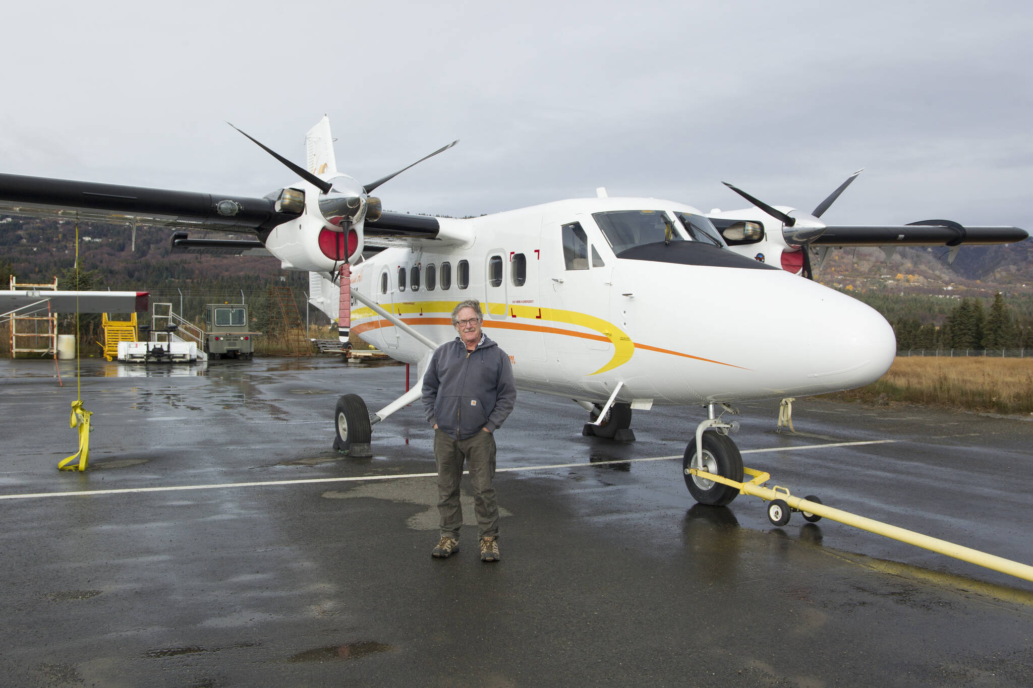 Gary Porter, owner of Bald Mountain Air Service, stands in front of his Twin Otter airplane Friday, Oct. 22. (Photo by Sarah Knapp/Homer News)