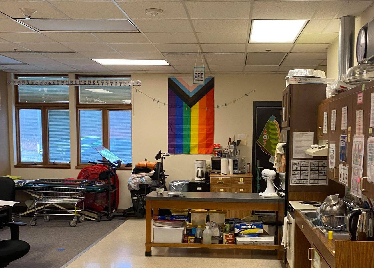 A progressive pride flag hangs in Winter Marshall-Allen’s classroom at Homer High School on Friday, Oct. 29, 2021 in Homer Alaska. Marshall-Allen was previously asked to take the flag and other symbols displayed in her classroom down, but was allowed to put it back up after filing a grievance with the Kenai Peninsula Borough School District.