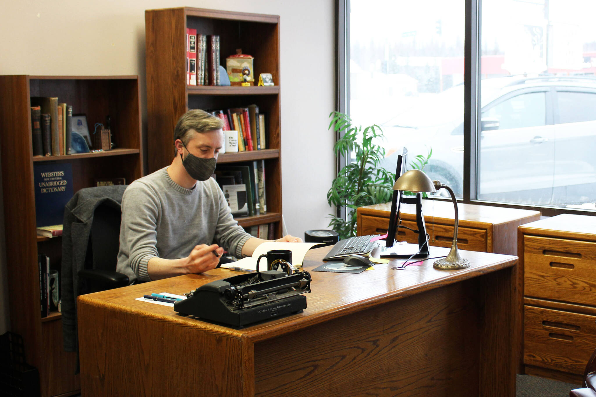 Kenai Peninsula Education Association President Nathan Erfurth works in his office on Thursday, Oct. 28, 2021 in Soldotna, Alaska. (Ashlyn O’Hara/Peninsula Clarion)