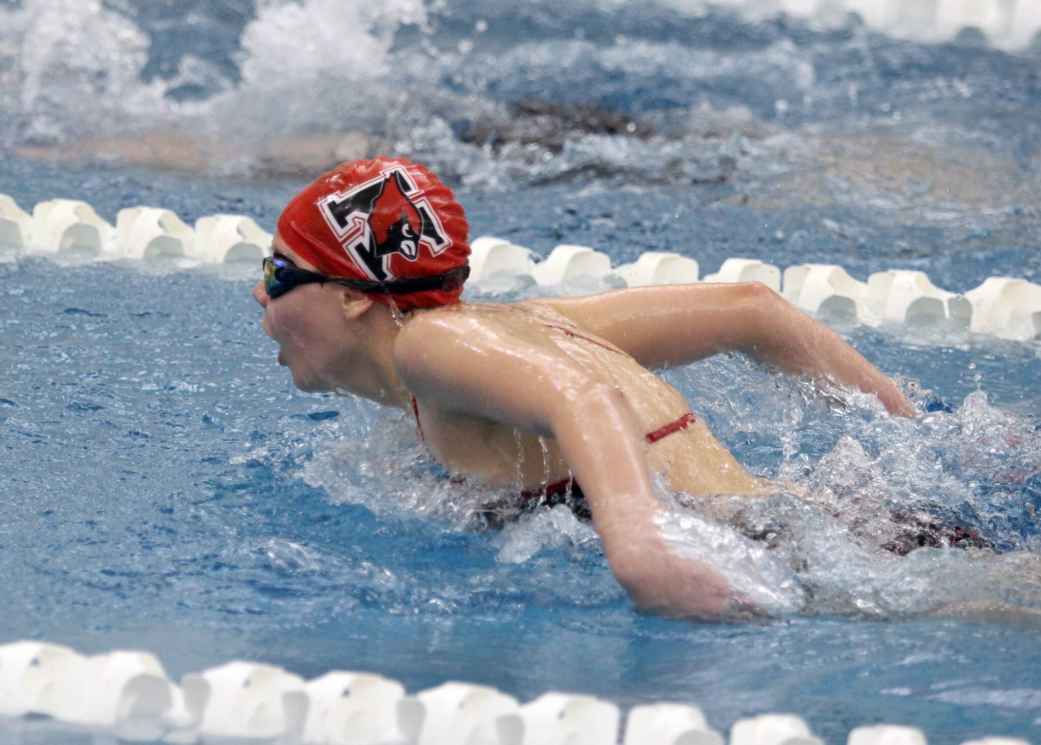 Jeremiah Bartz/Frontiersman Kenai Central’s Michelle Duffield competes in the girls’ 100-yard butterfly during the Northern Lights Conference meet Saturday, Oct. 30, 2021, at the Palmer Pool in Palmer, Alaska.