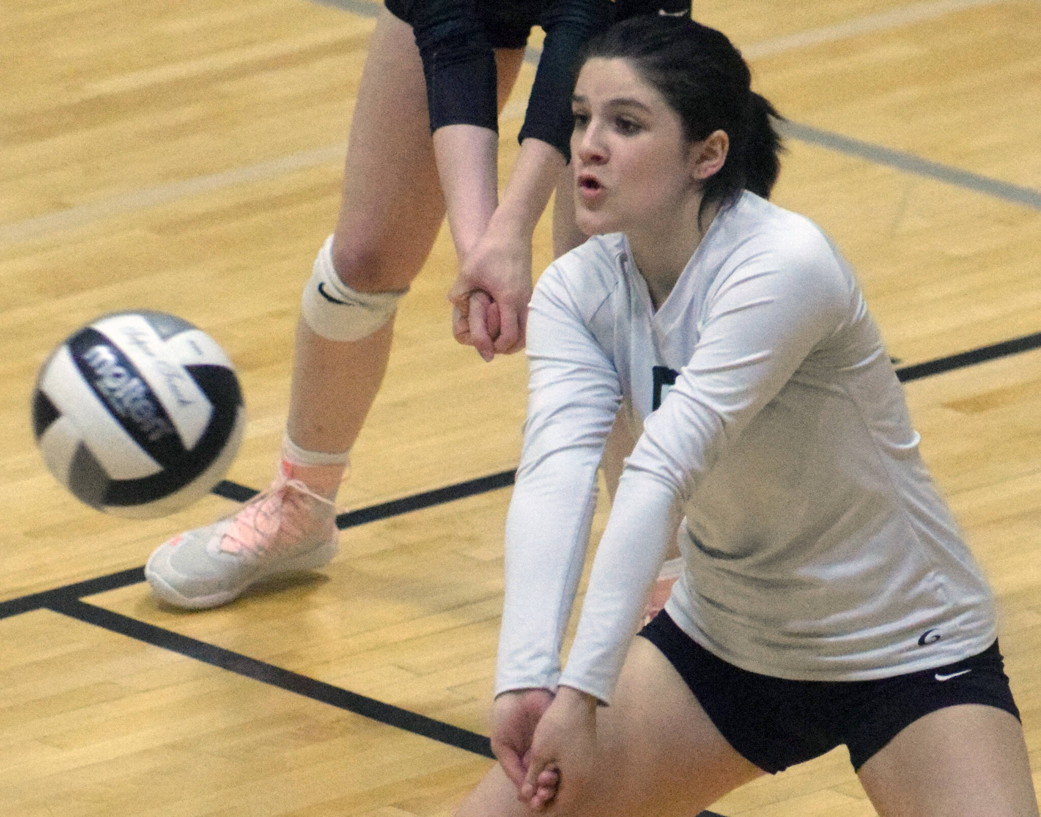 Seward’ Maria Bunch digs up a ball against Nikiski on Wednesday, Nov. 3, 2021, at Nikiski High School in Nikiski, Alaska. (Photo by Jeff Helminiak/Peninsula Clarion)