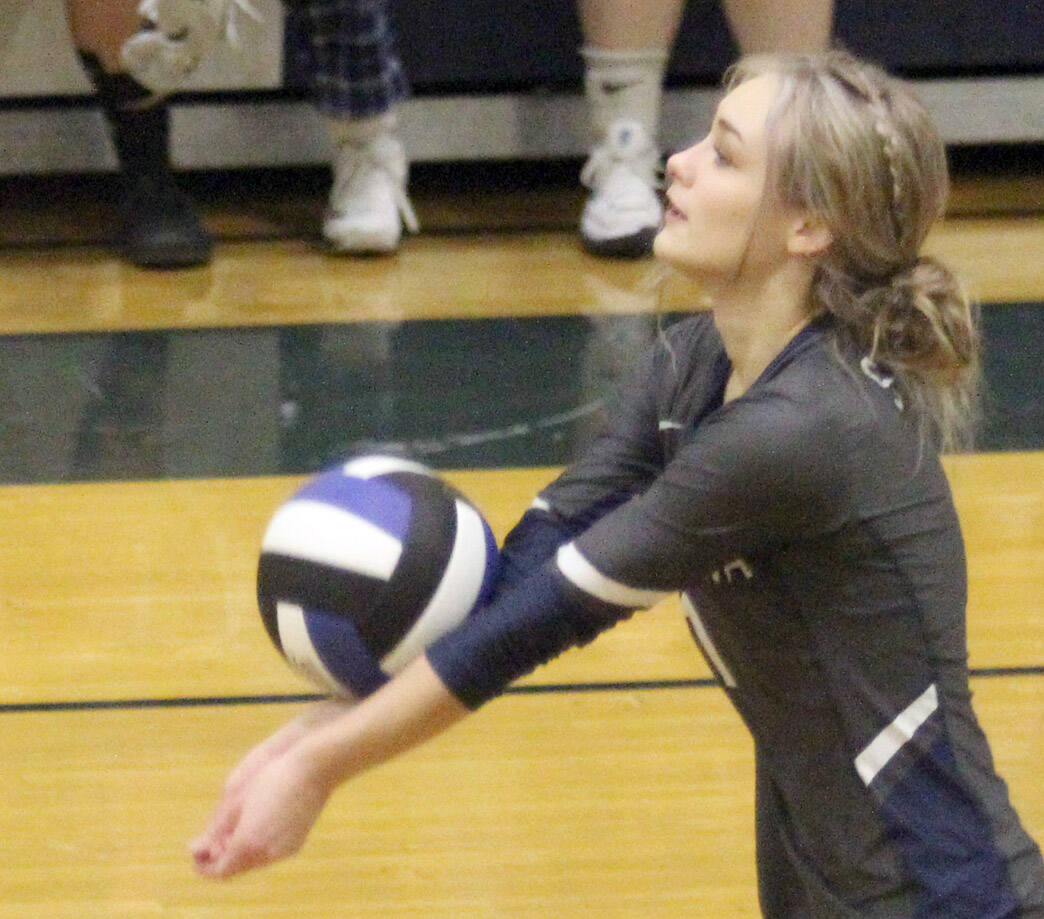 Soldotna’s Jolie Wildaman receives a serve during the first day of the Northern Lights Conference Championships on Thursday at Palmer High School. (Photo by Jeremiah Bartz/Frontiersman)