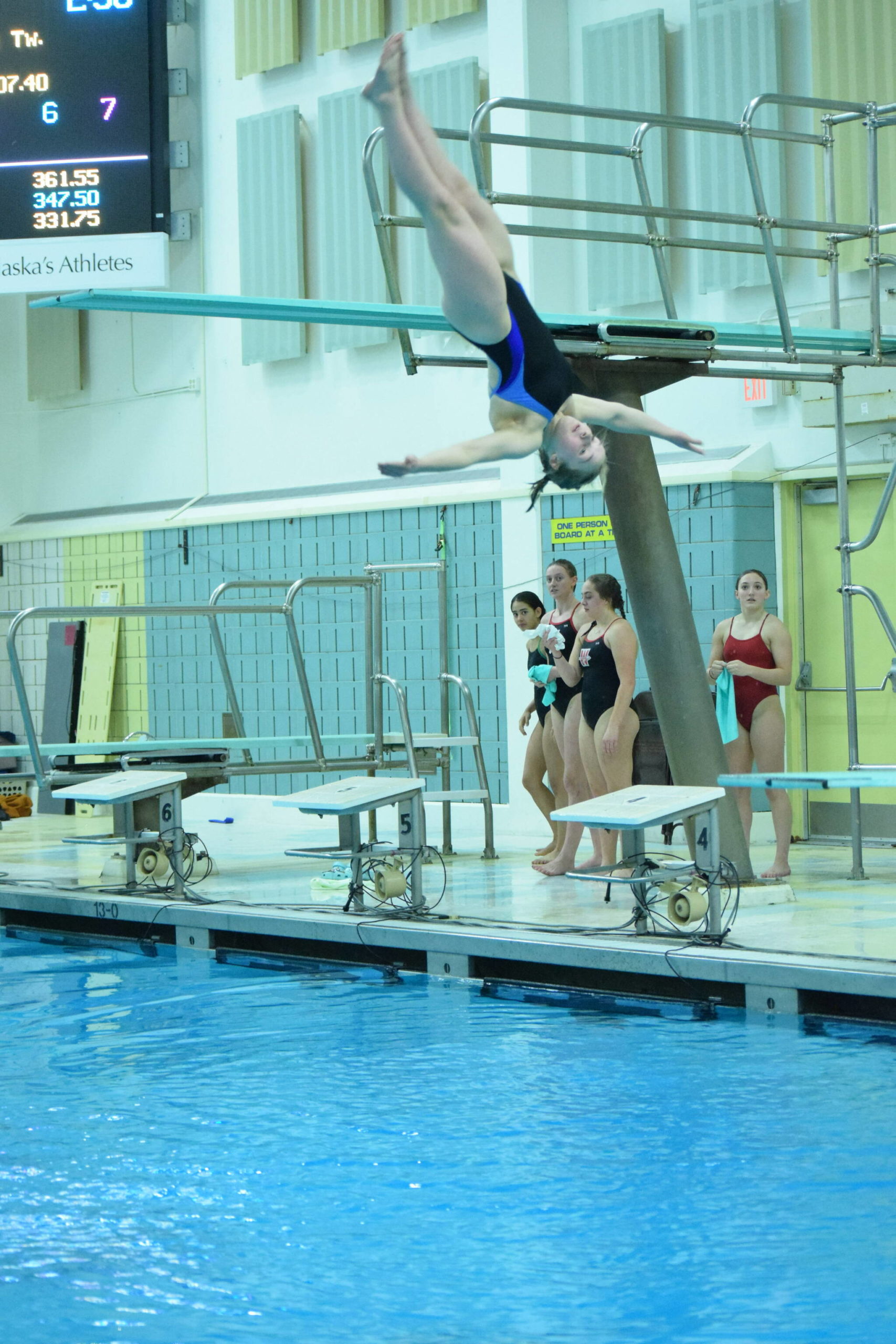 Soldotna’s Abriella Werner competes in the state diving finals at Bartlett High School in Anchorage on Saturday, Nov. 6, 2021. (Camille Botello/Peninsula Clarion)