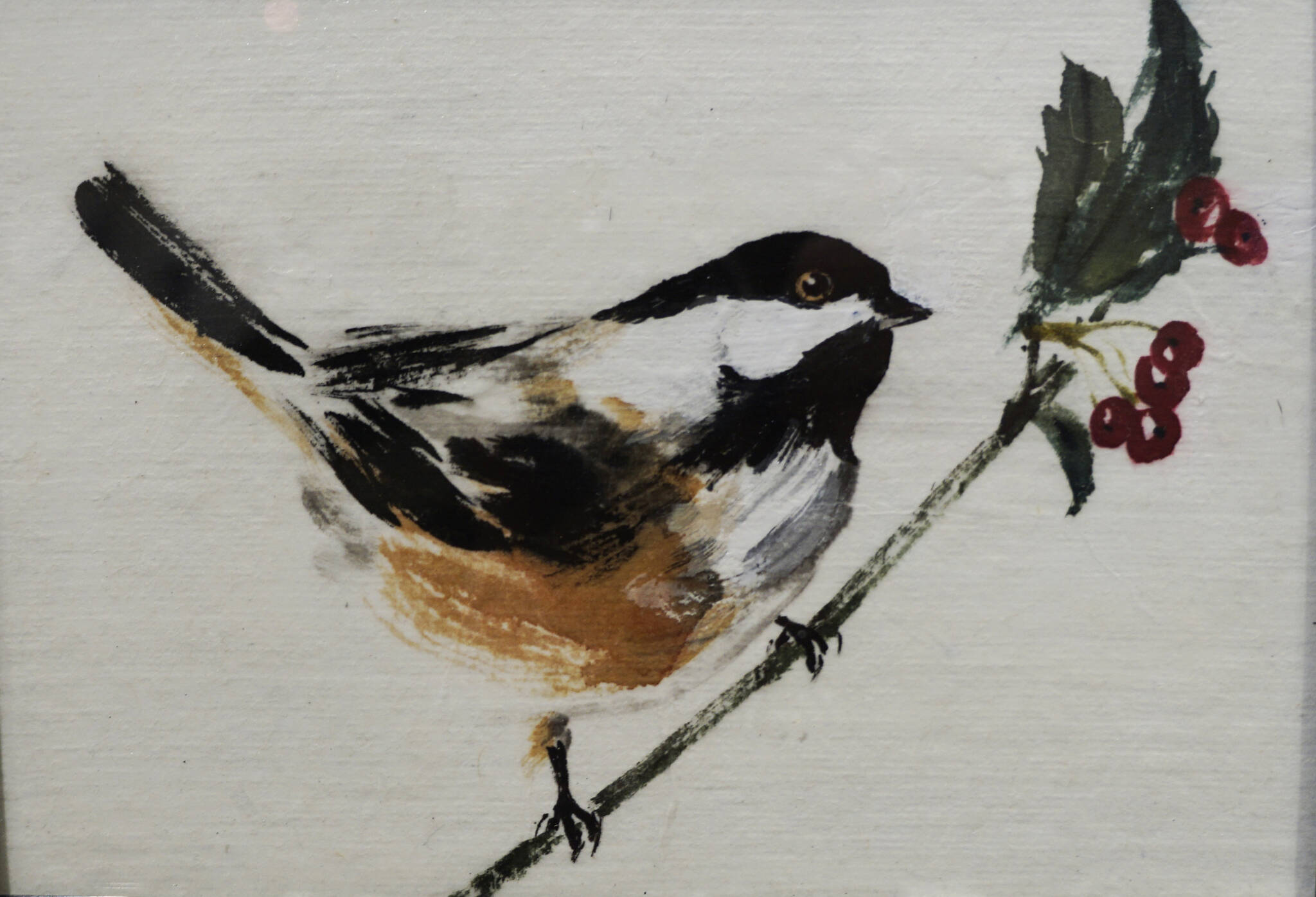 Sharlene Cline’s “Black-capped Chickadee and Holly” is one of the works showing in the Homer Council on the Arts “Fun wtih 5x7” show through Dec. 22, 2021, at the gallery in Homer, Alaska. (Photo by Michael Armstrong/Homer News)