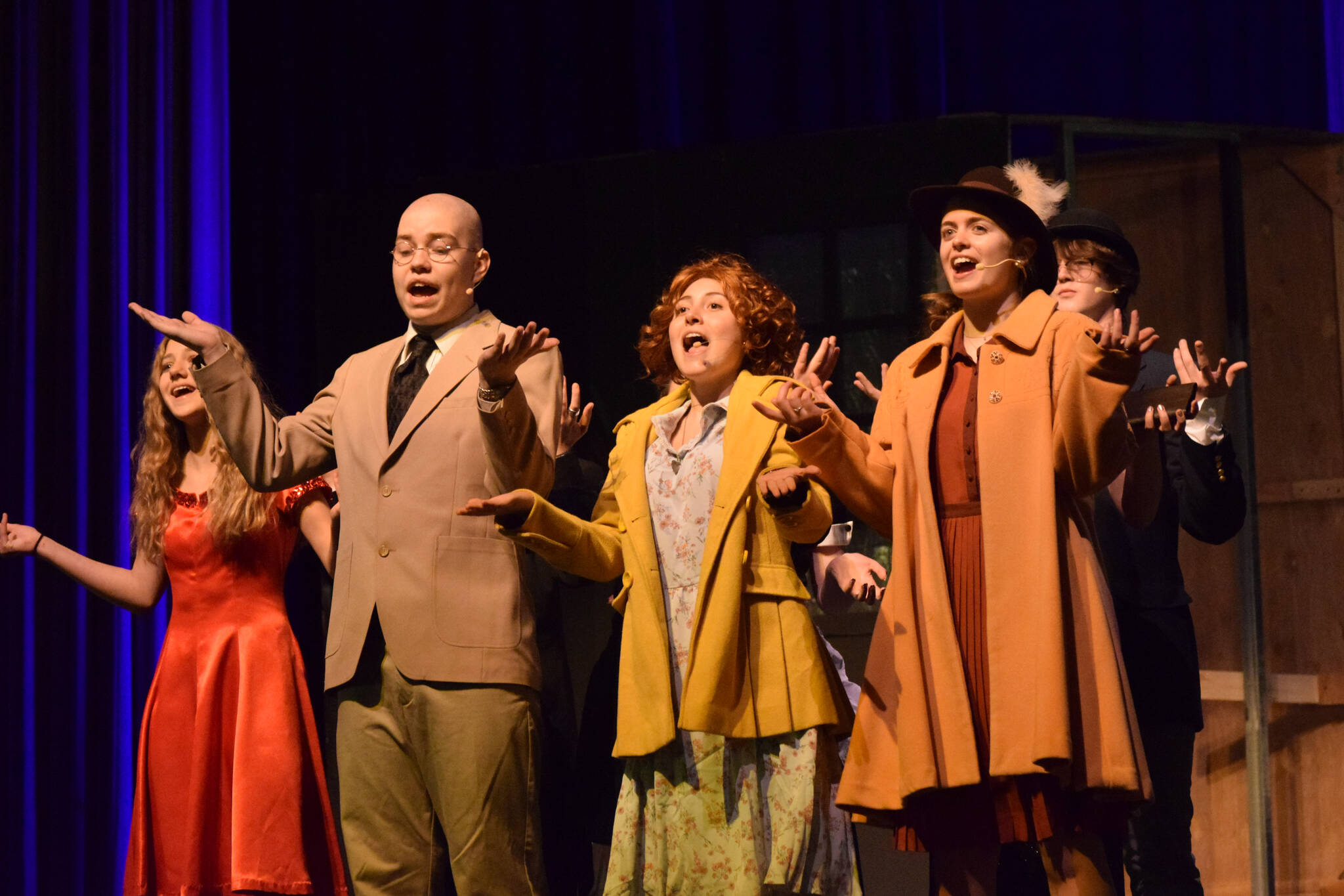 The case of “Annie” rehearses at Soldotna High School on Tuesday, Nov. 9, 2021. (Camille Botello/Peninsula Clarion)