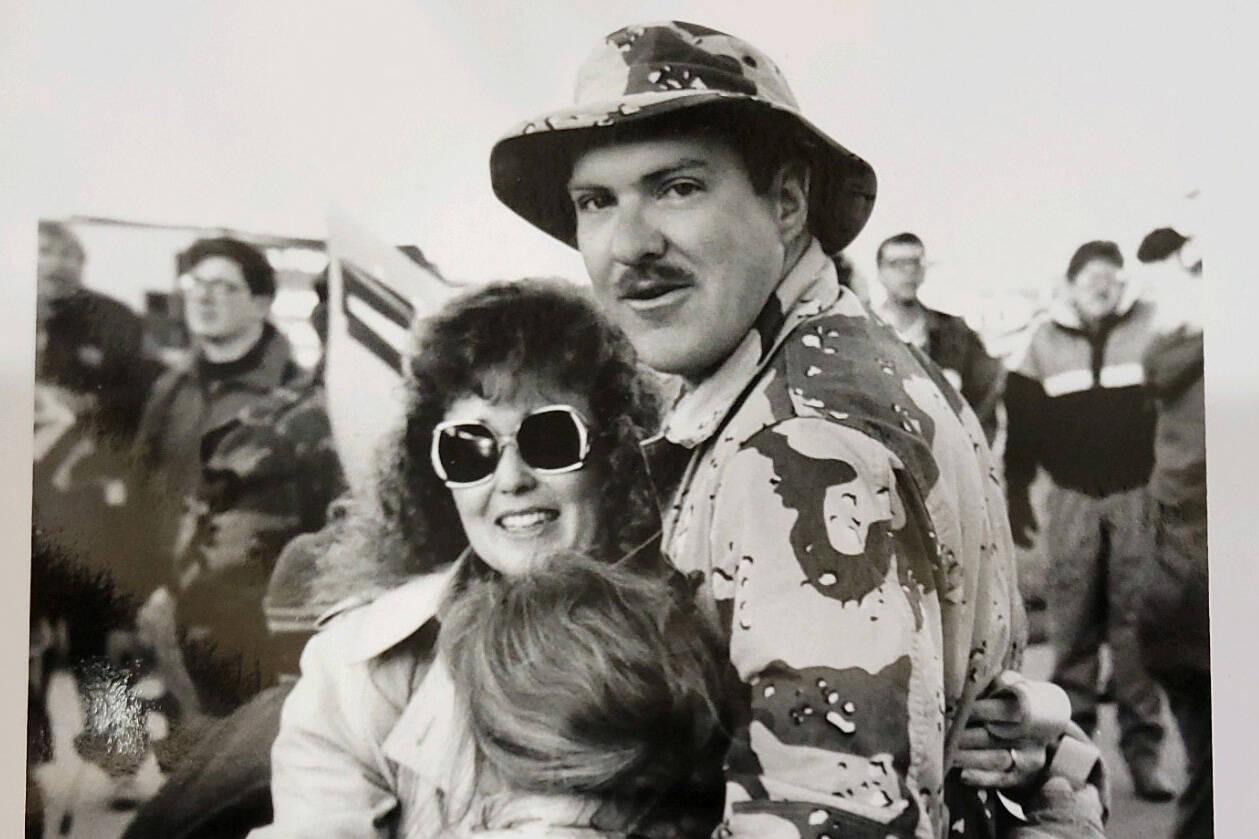 Leroy Keene returns home from Desert Storm in 1990 and is welcomed by his wife and daughter. (Photo provided by Leroy Keene)